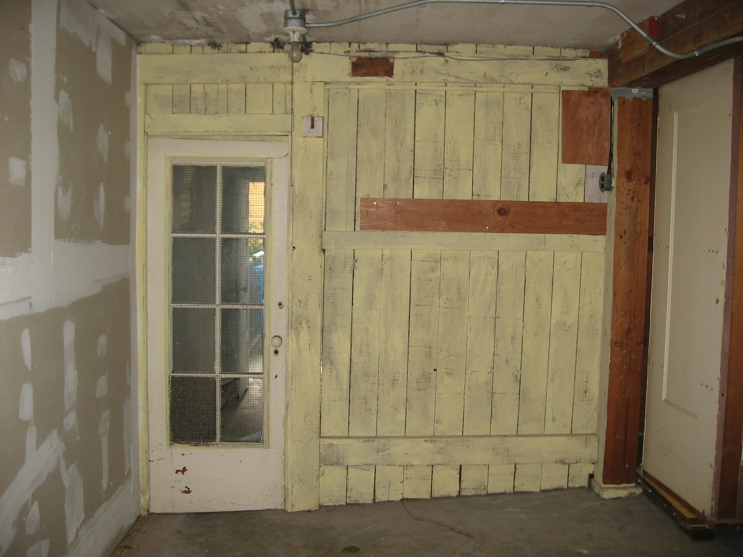 Existing basement storage space/ entry door