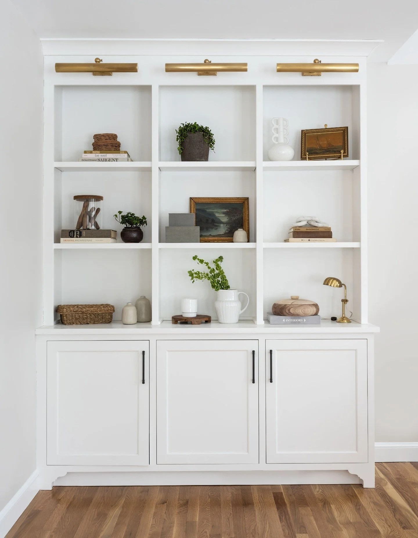 A place for the pieces that tell your story: These built-ins were designed to showcase the favorites&mdash;collected objects, well-loved books, little moments of personality layered in. Equal parts storage and display, because the things you love des