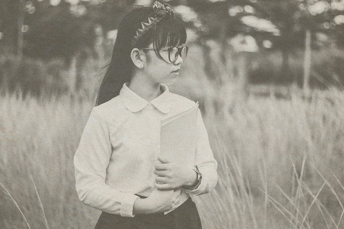 old picture of young asian girl in fields.jpg