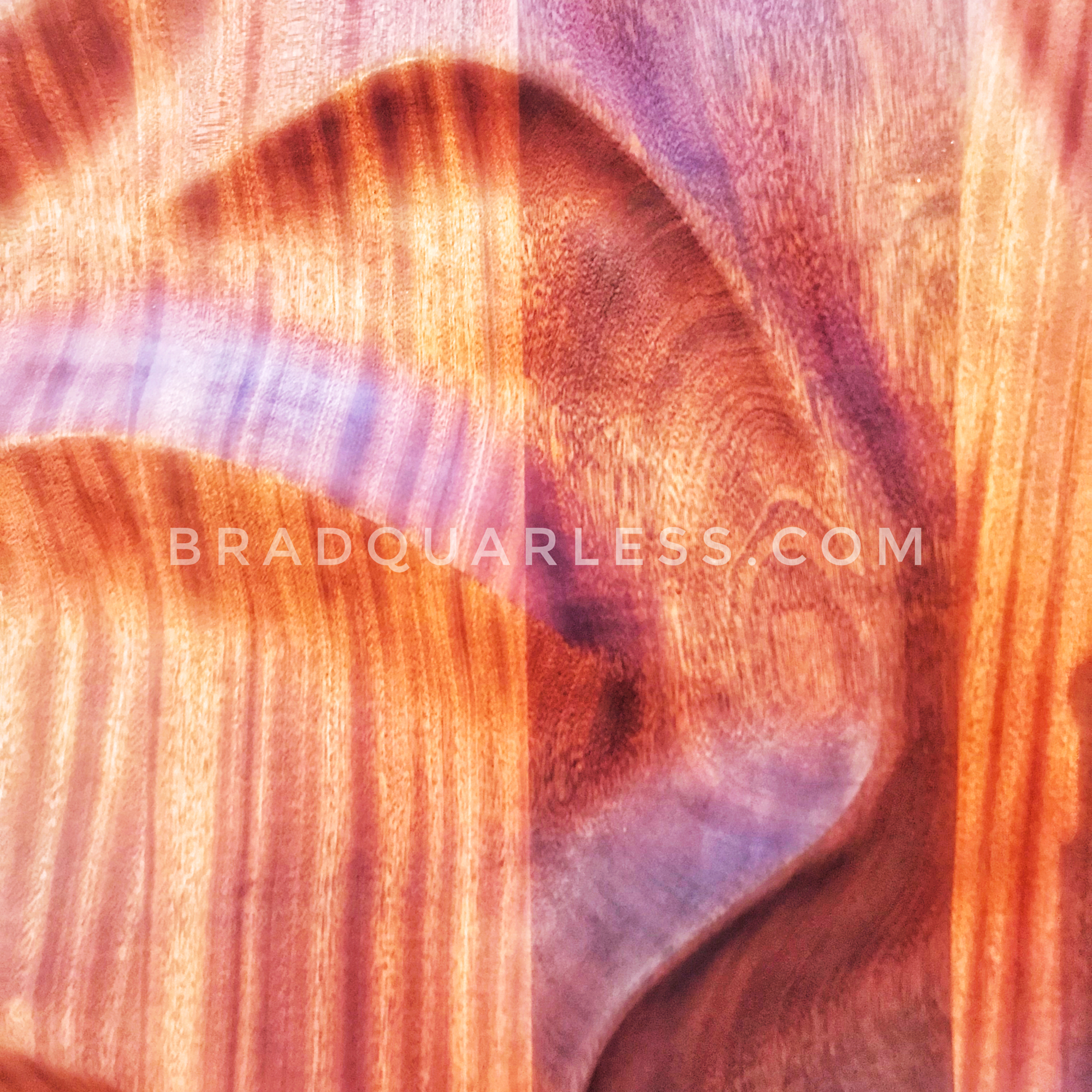 Detail shot of the curved sand lines in Sapele wood. 