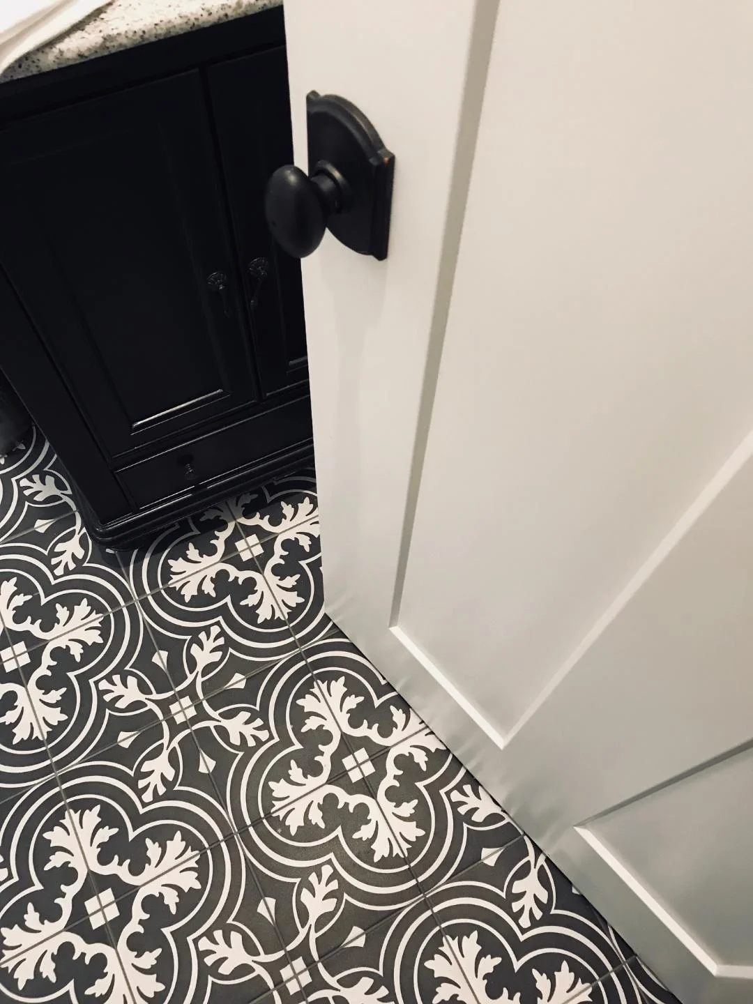 Black and white Tile: Black and while tile was popular and widely used throughout the 1920's. So, I decided to do something fun in the powder and laundry room. At first I was unsure about this bold print but now I wish we had more of it! I love how it turned out and we get a lot of compliments on it.
