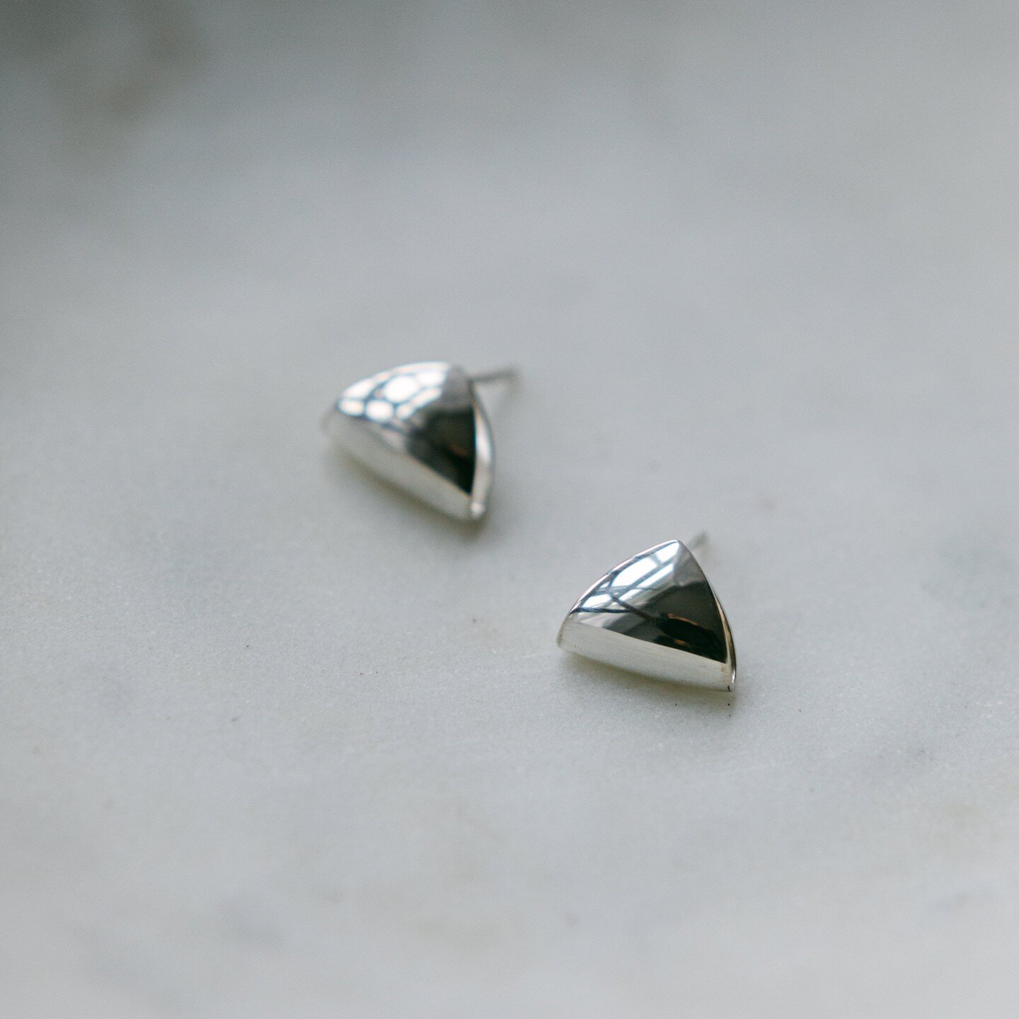 14 days until Christmas! YAY! These triangular puffed studs have been a best seller since I put them into production. If you didn't hear, I am having a site wide sale! 15% until the 15th of December. You can snatch a pair of these for yourself...some