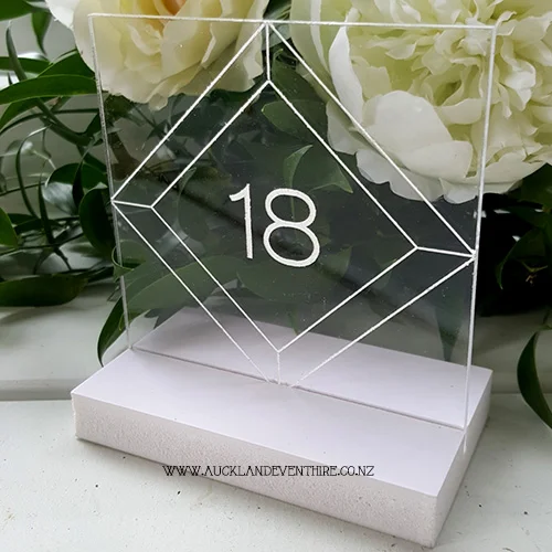 white-perspex-geometric-table-numbers-auckland-wedding-event-hire-party