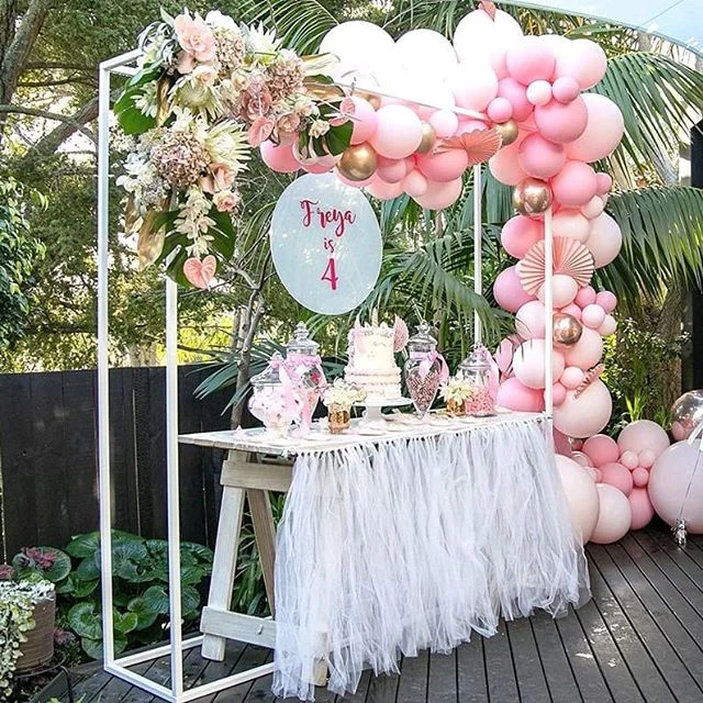 Our chic new white box frame looking fab all styled up with balloons and florals for this 4th bday party. Complete with the candy bar and cake on our trestle table. Yum!

Photos by @katie.hodgsonnz , Flowers by @erydayimblossoming , Beautiful cake by @megrcakes , Balloons by @prettylittlepackage.balloons , Cookies by @karenssugargarden , Decals by @contagiously_funky , Decorations & tableware @ThePartyBoxCompany , Styling by Jo Hough