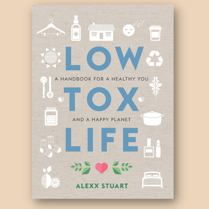 Cover of the book 'Low Tox Life: A Handbook for a Healthy You and a Happy Planet' by Alexx Stuart, featuring various eco-friendly icons like a recycling symbol, leaves, and household items.