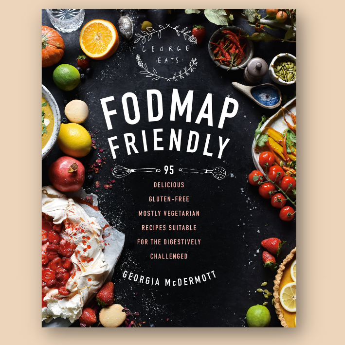 Cover image of cookbook 'FODMAP Friendly' by Georgia McDermott, featuring assorted fruits and vegetables around text detailing 95 recipes that are delicious, gluten-free, mostly vegetarian, and suitable for digestive challenges.
