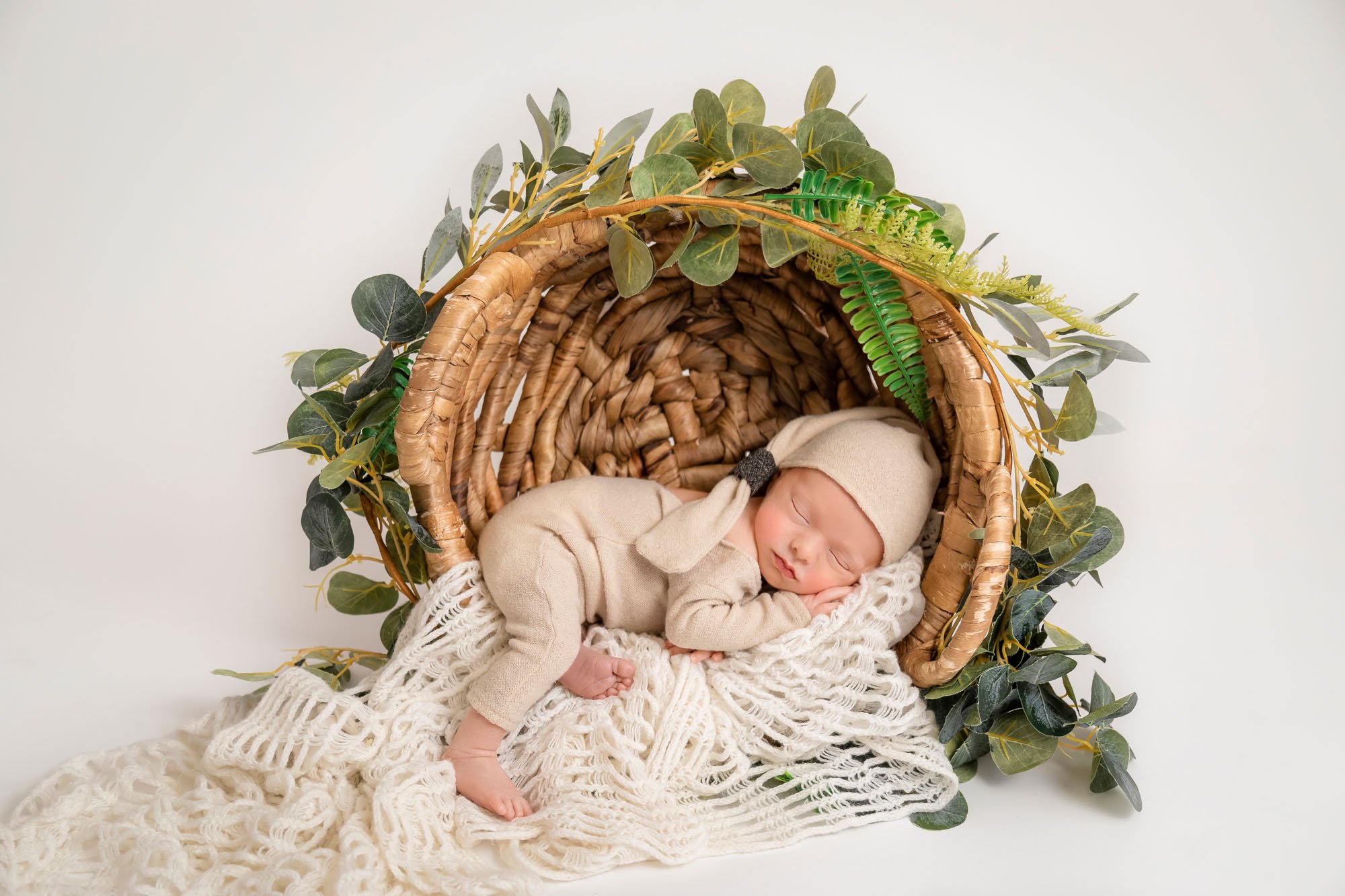 newborn-photography-in-leeds-baby-in-basket-woodland.jpg