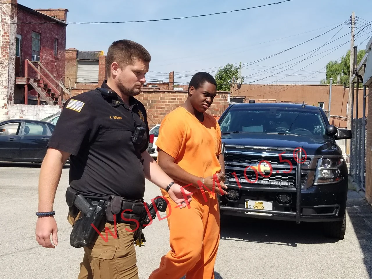 Wabash County Sheriff’s Deputy Keagan Bogard escorts armed robbery suspect Latrell S. Coe back to the Wabash County Jail following this morning’s court appearance.
