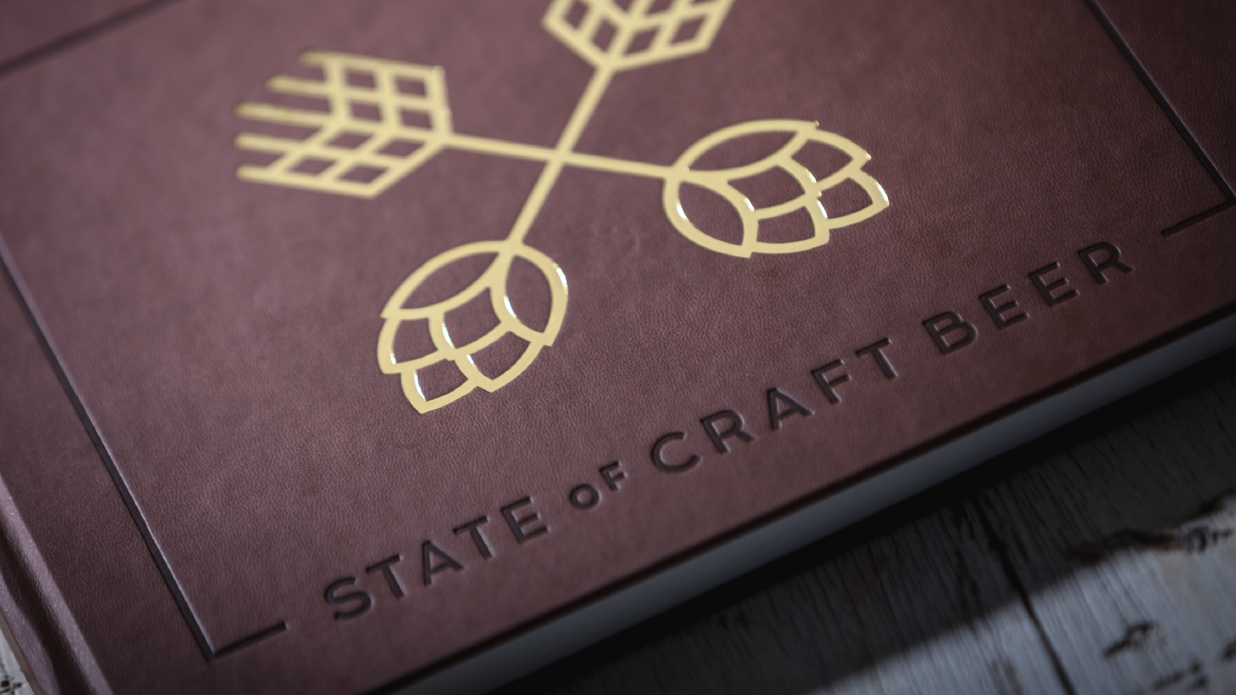 Hot-pressed and foil-stamped hardcover, hand-lettered typography