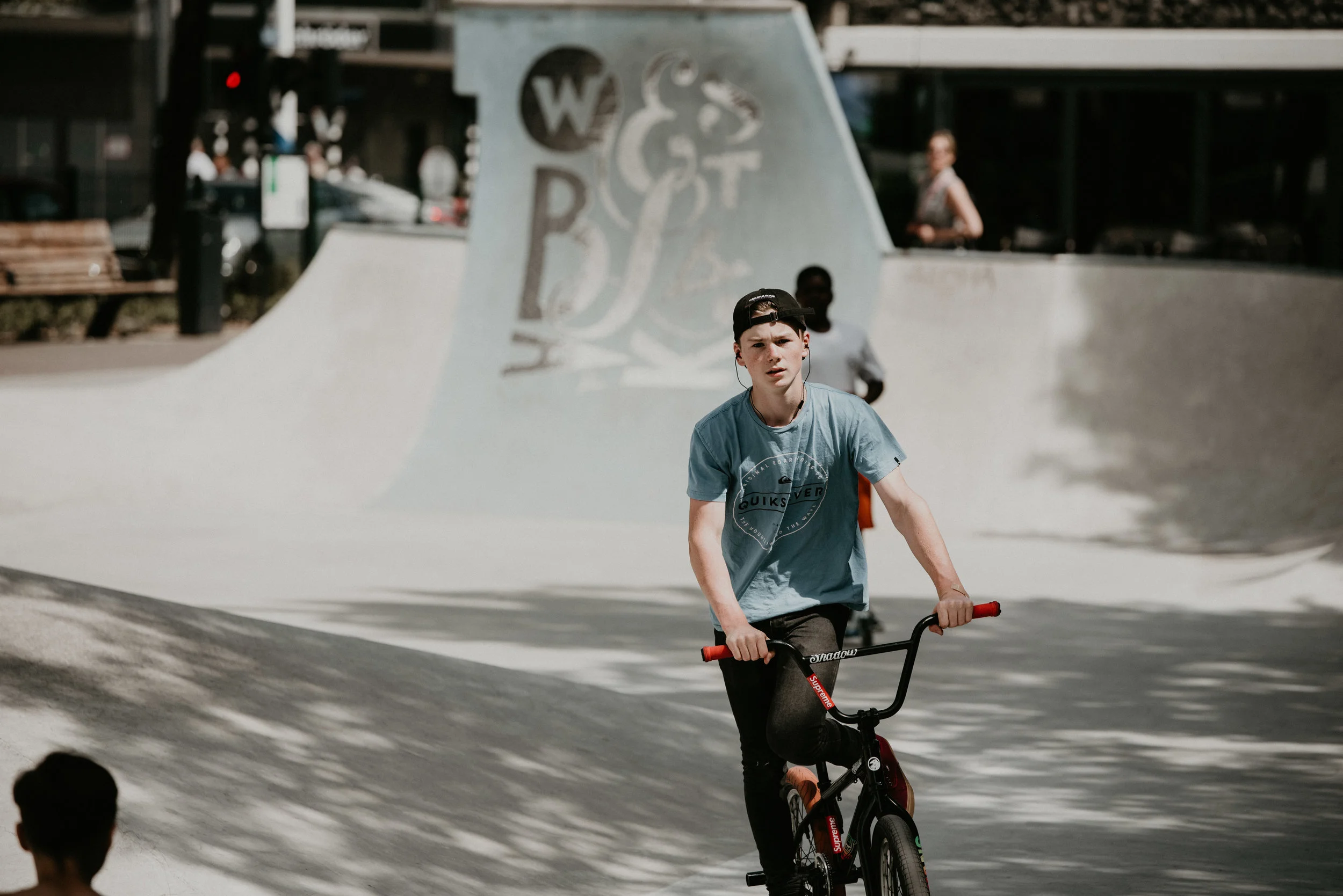 Teenage boy at the rotterdam skatepark on westblaak. He is riding a bmx bike