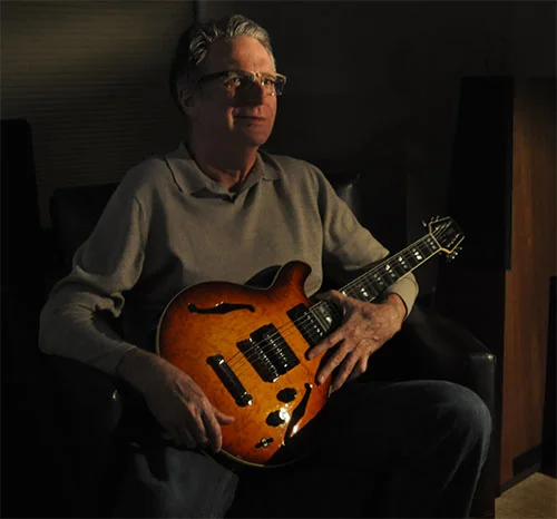 Rick Milam with a prized guitar.