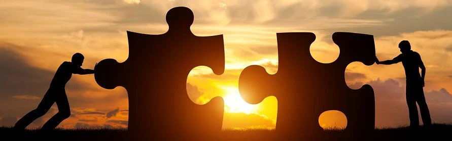 bigstock-Two-men-connect-two-puzzle-pie-127357196-e1483565829849.jpg