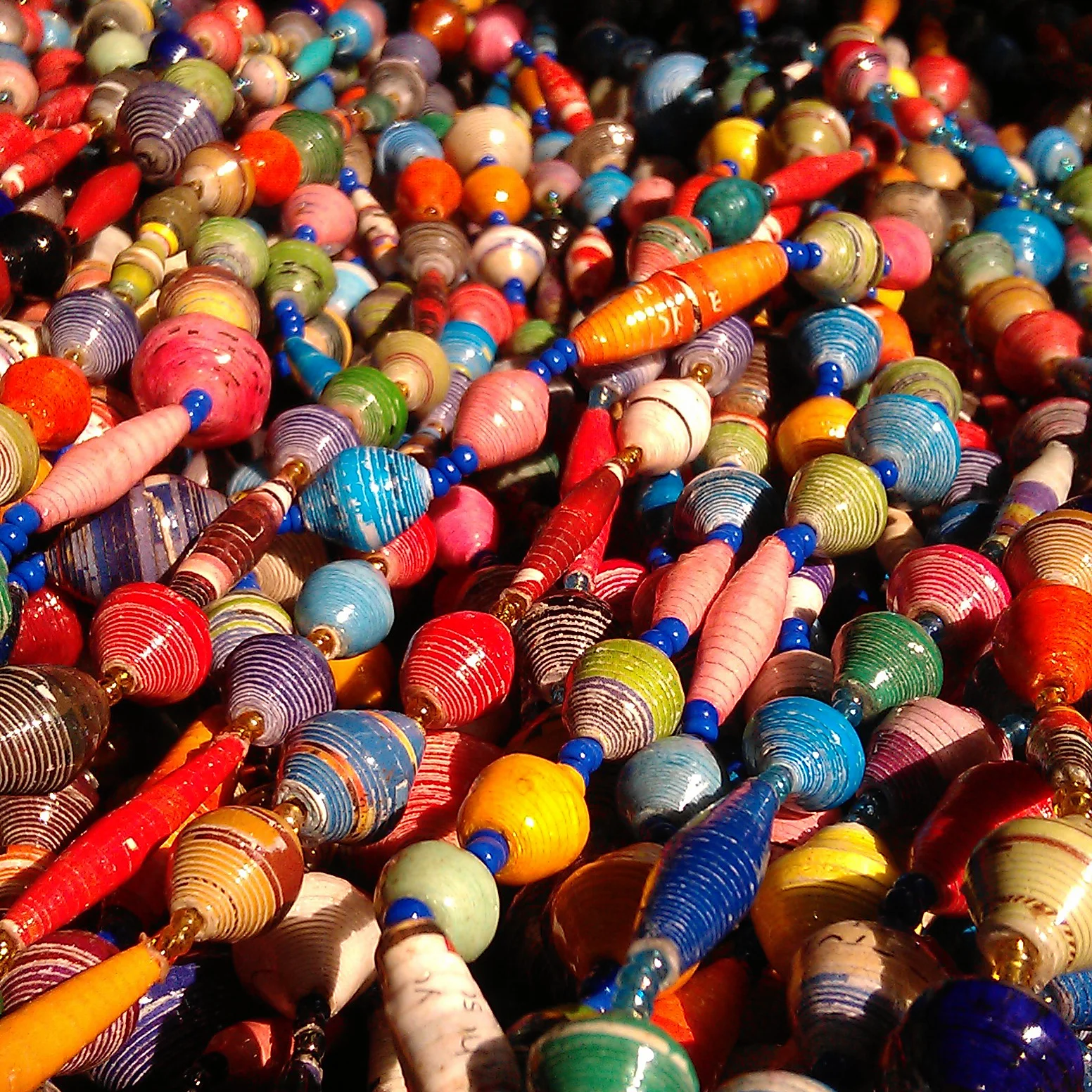 A rainbow of recycled paper beads