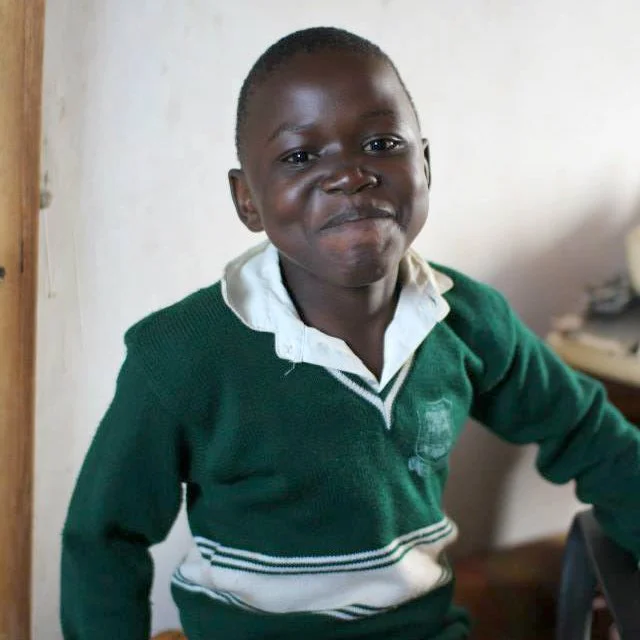 Tom_school_uniform_awamu_giftsthatchangelives.jpg