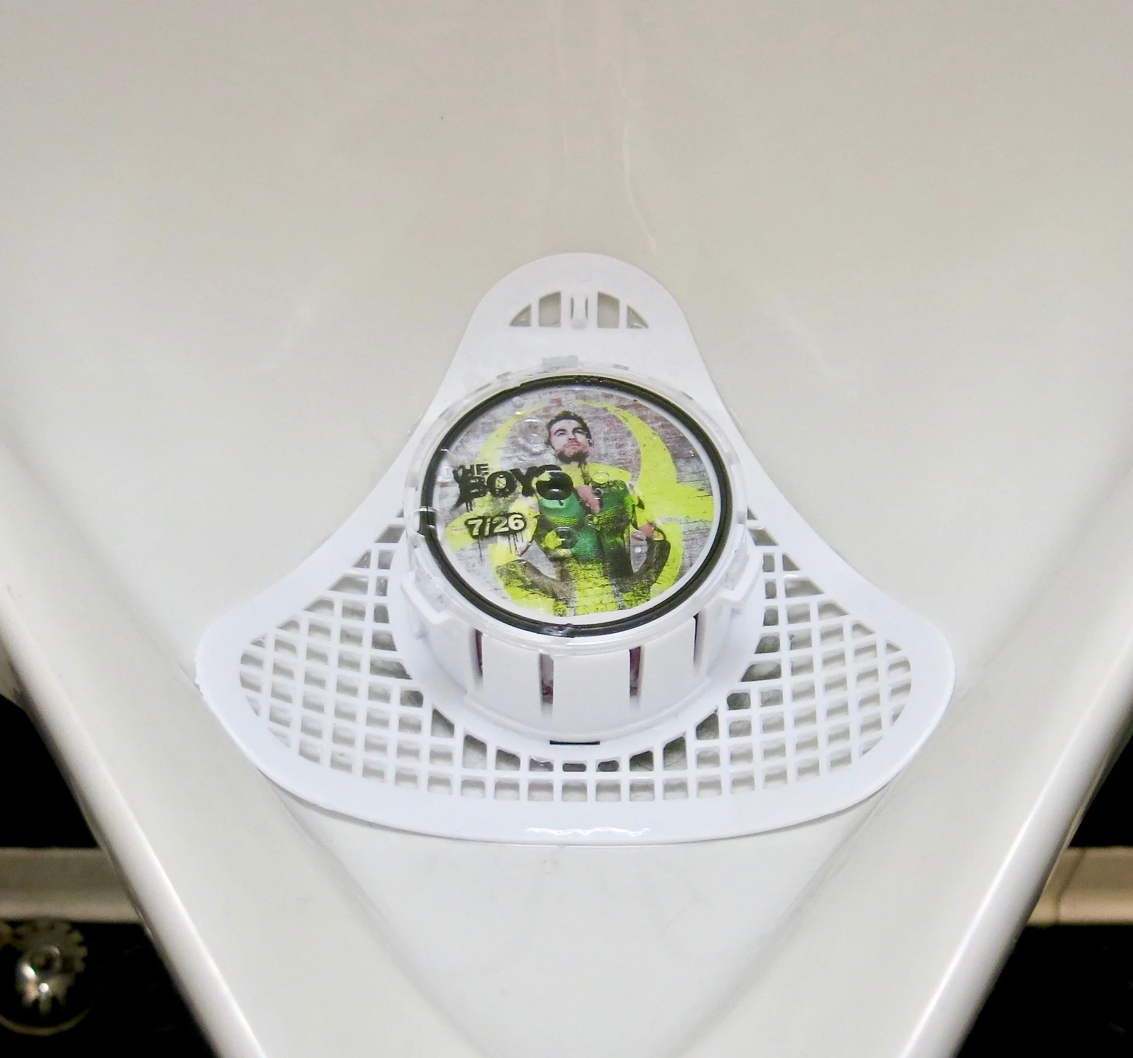 Amazon Prime Deploys Branded Urinal Screens and Bar Coasters to Reach Men in Bars.