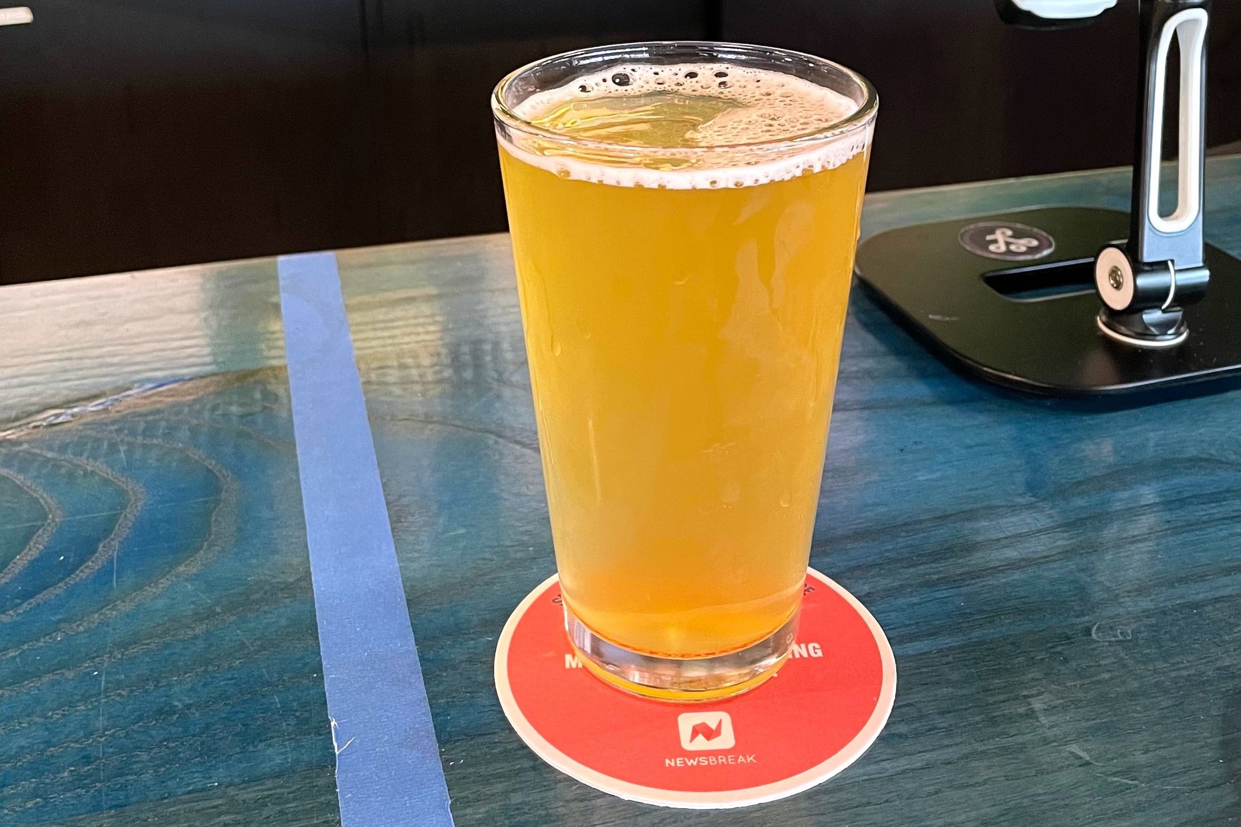 NEWSBREAK DISTRBUTES BAR COASTERS IN DENVER &amp; CHARLOTTE