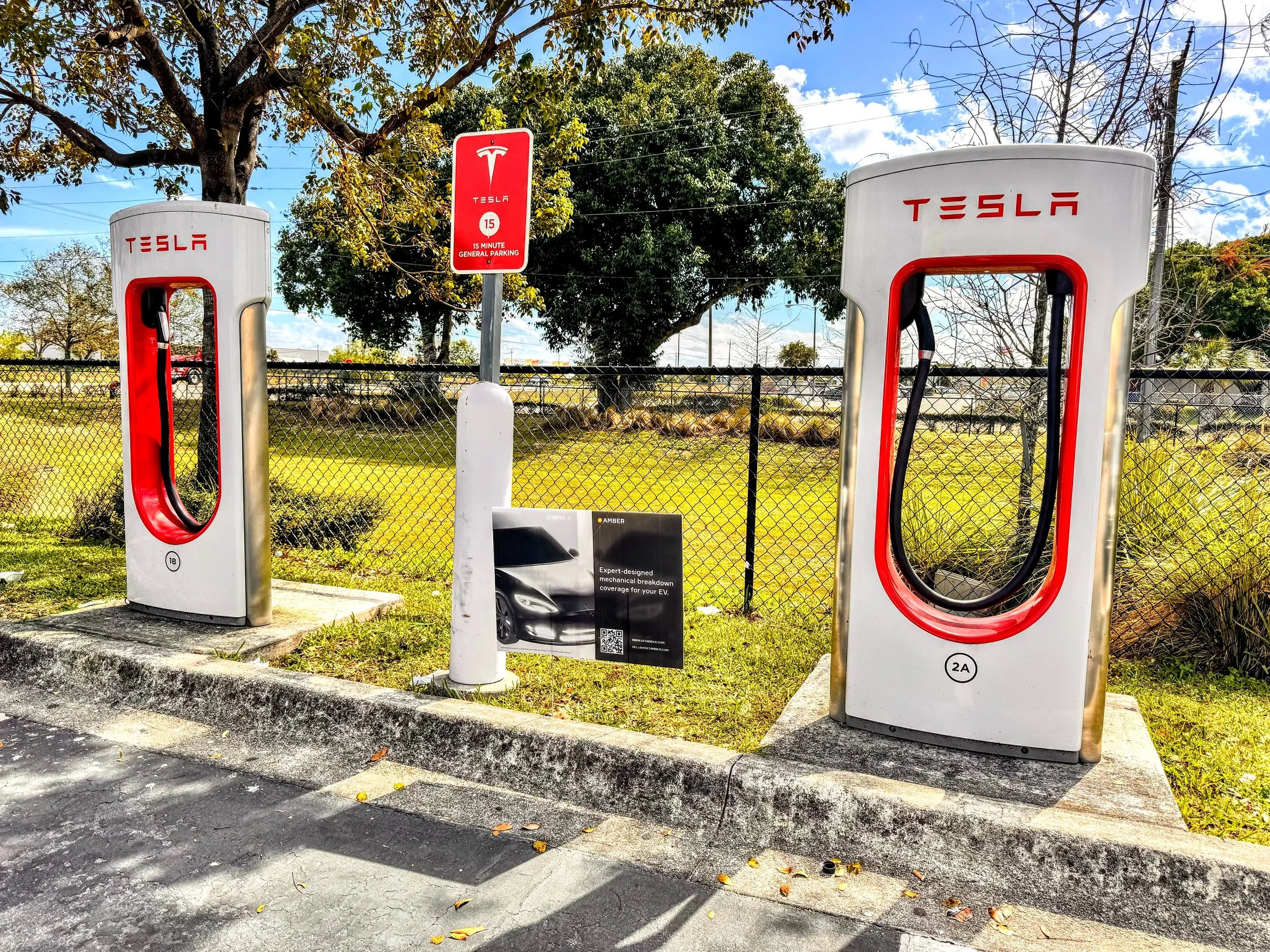GETAMBER GOES DIRECTLY TO TESLA OWNERS WITH YARD SIGNS NEAR EV CHARGERS