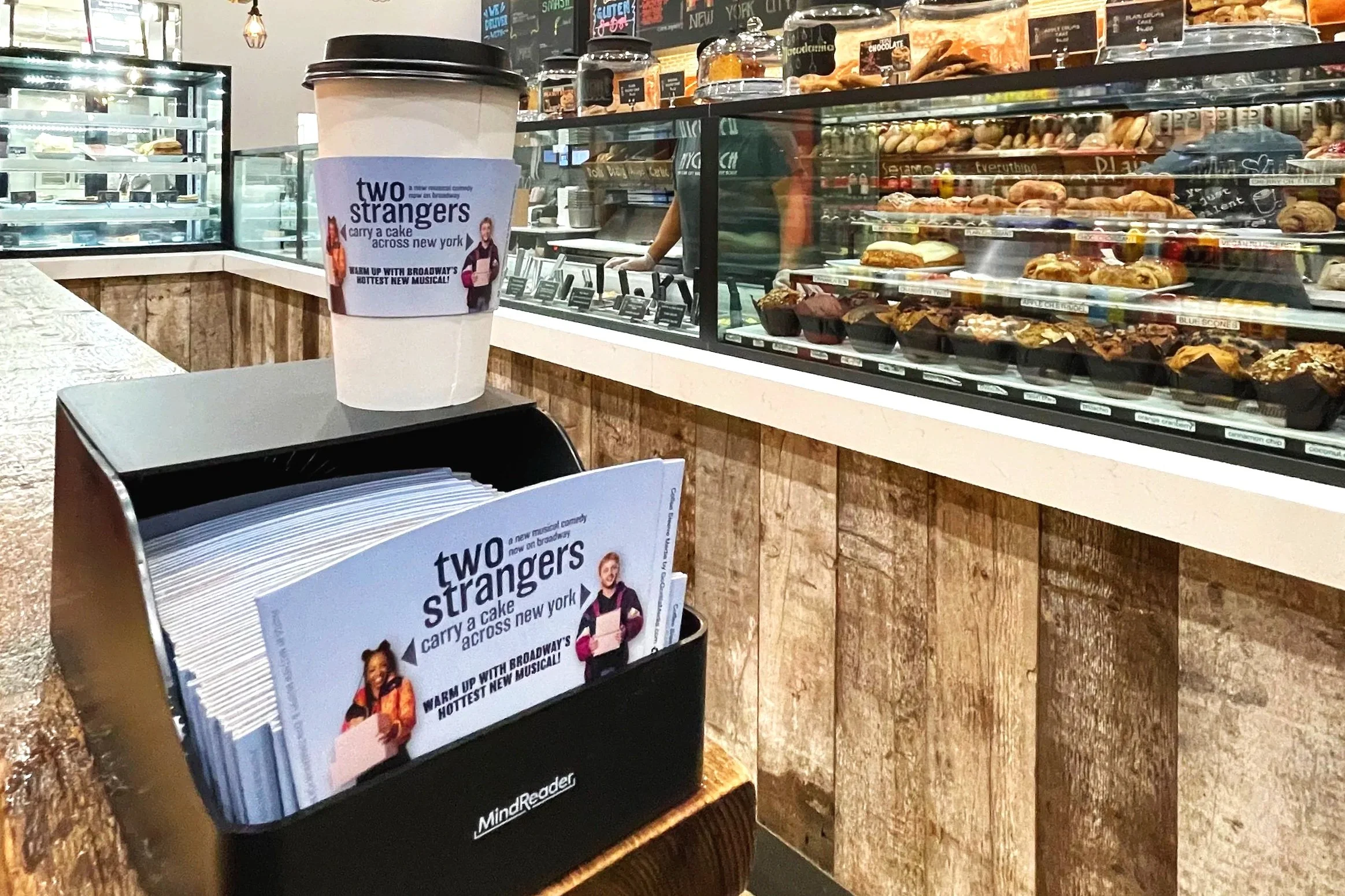 Broadway Goes Guerrilla: New Coffee Sleeve Promotion for Two Strangers Broadway Show