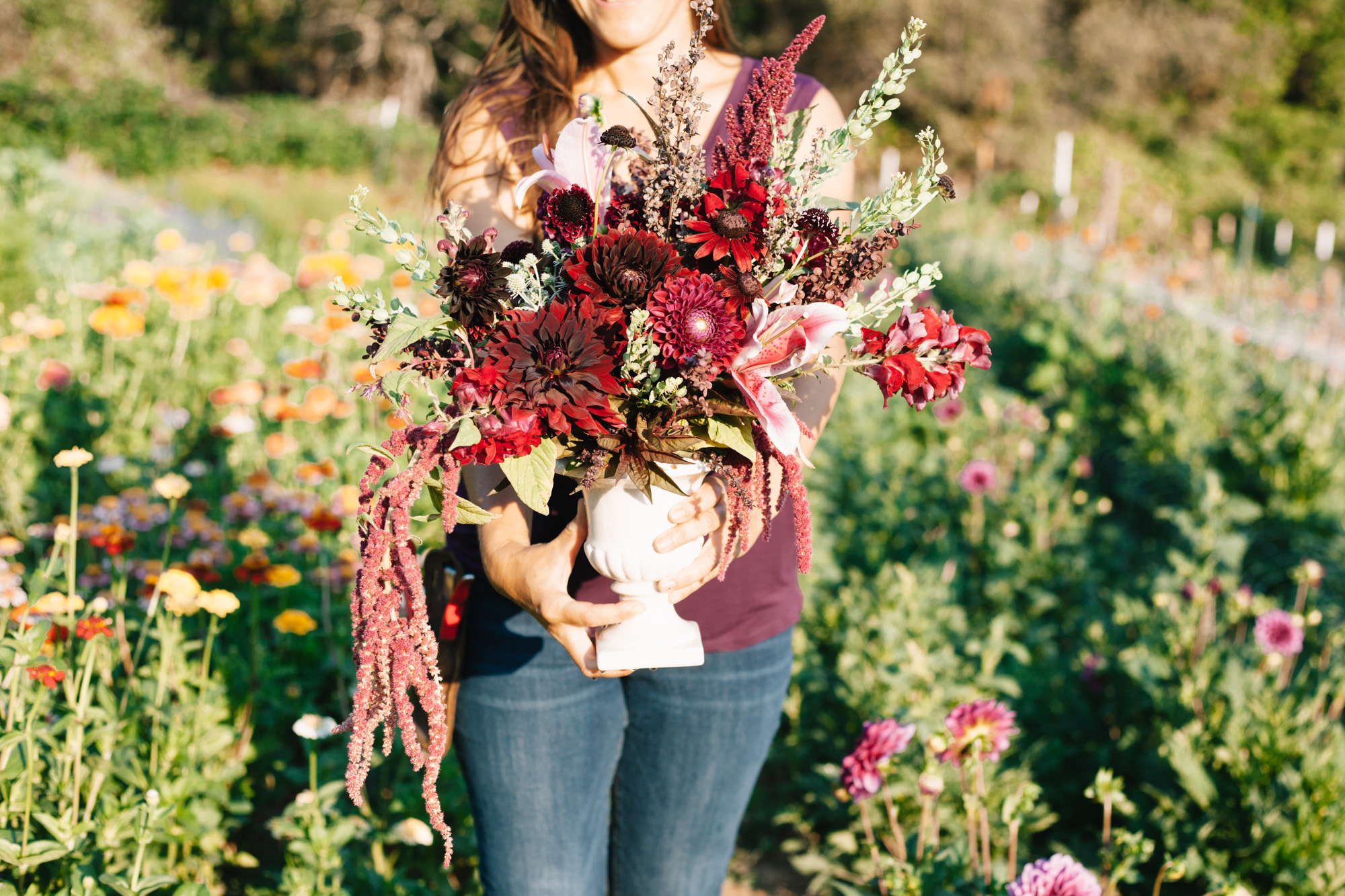 And here I am with a centerpiece arrangement in the field near where these flowers were harvested.