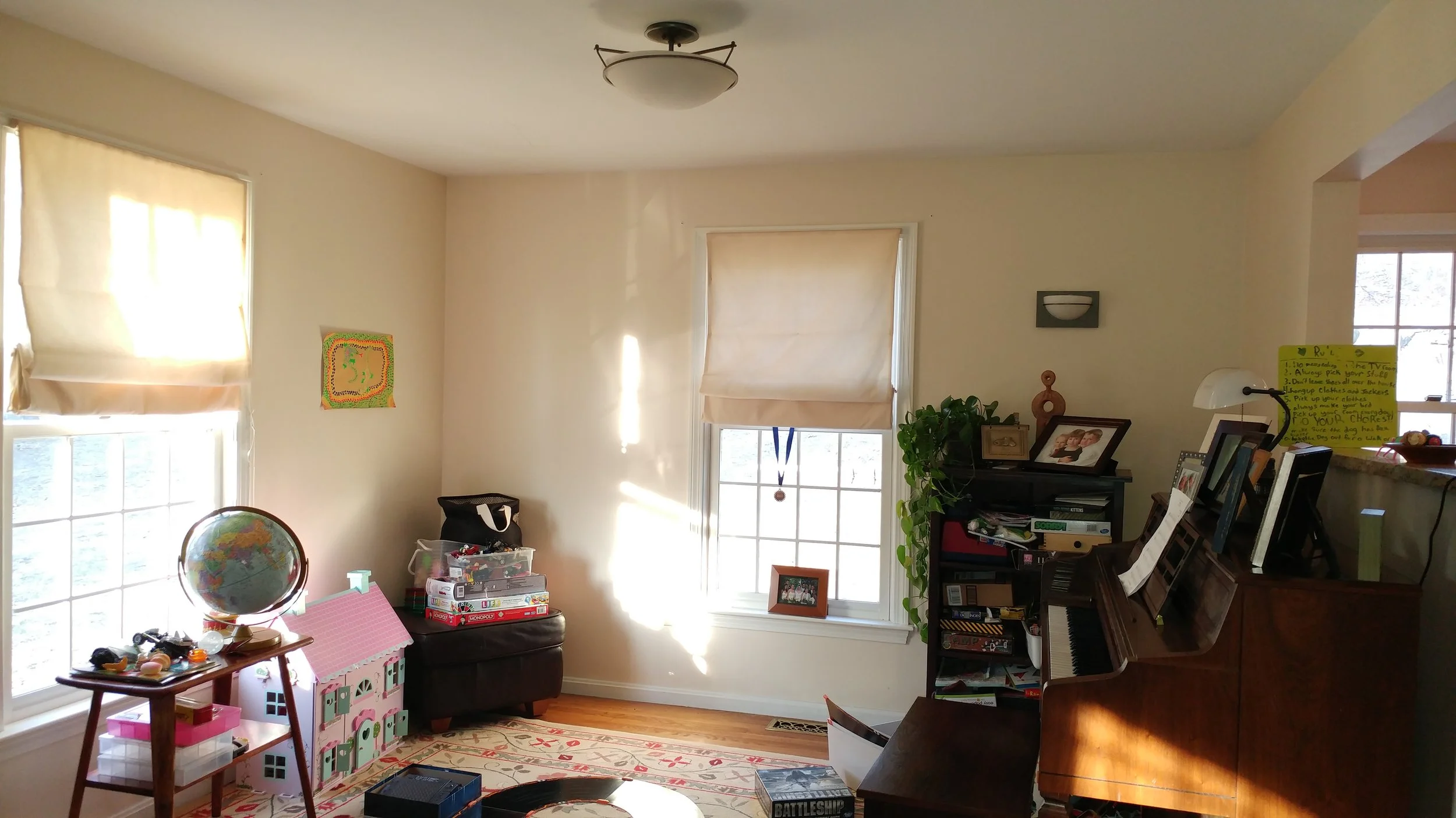 BEFORE: This is a playroom that was transformed into a proper dining room by Gloom to Bloom Decorating. The family can now gather in a common area to share meals, do homework or simply chat over a cup of tea.