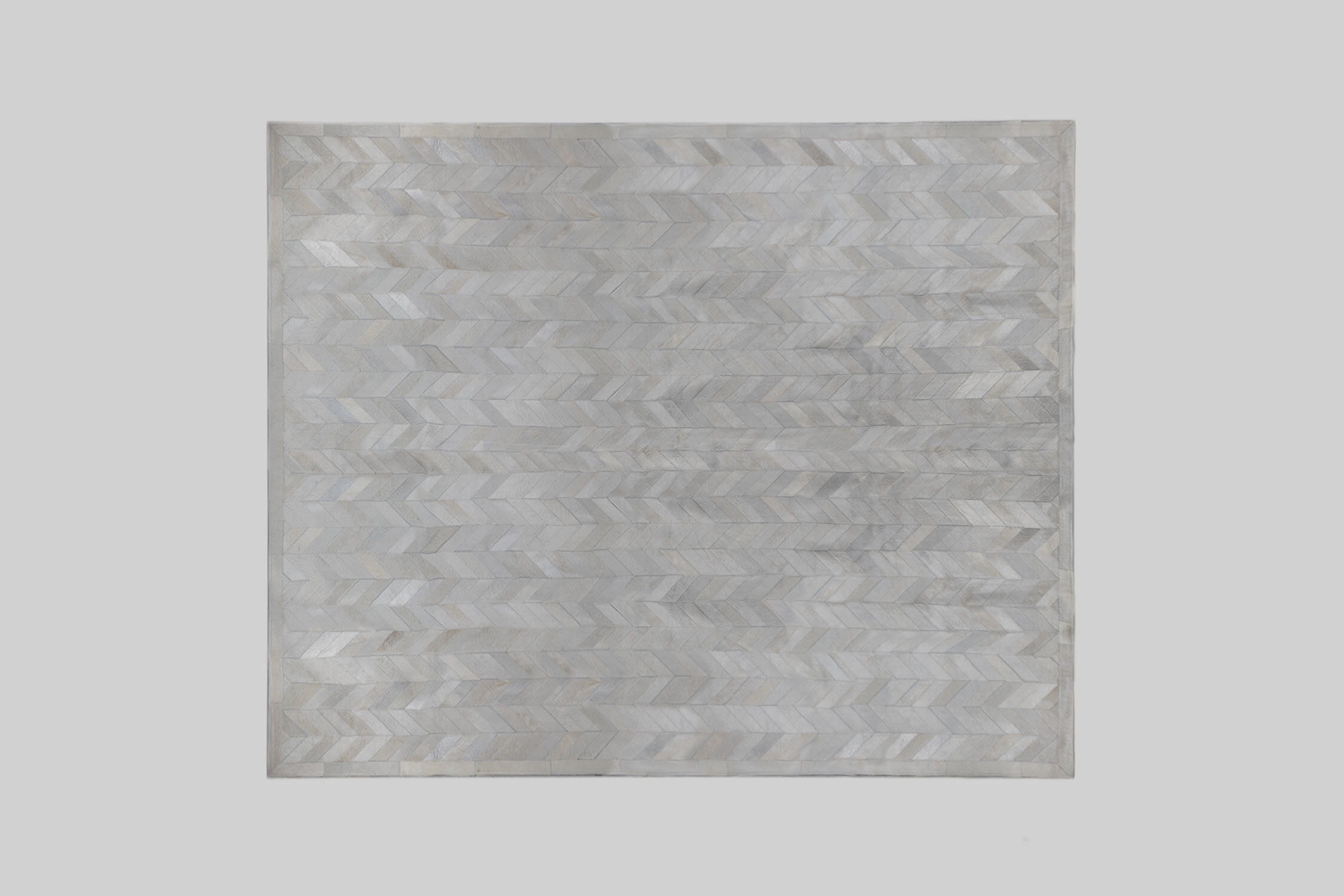 WHITE HERRINGBONE PATCHWORK COWHIDE RUG