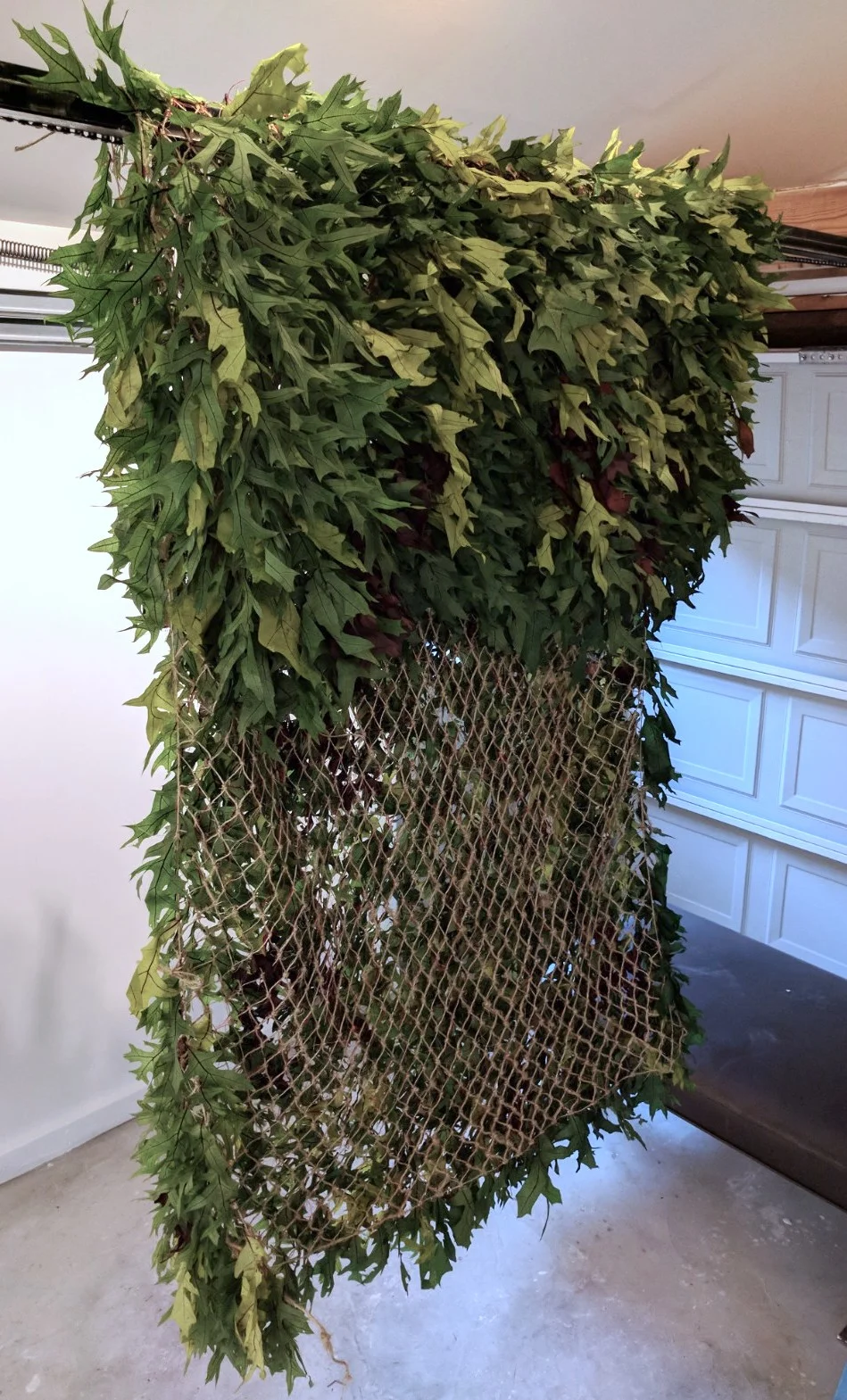 Dara Engler Camoflauge Blanket , 2017 Twine, leaves