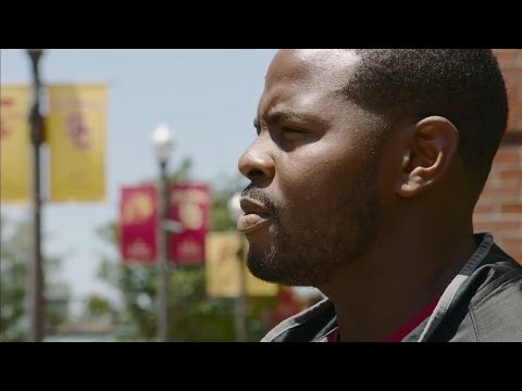 USC's Kenechi Udeze overcomes leukemia, named defensive line coach