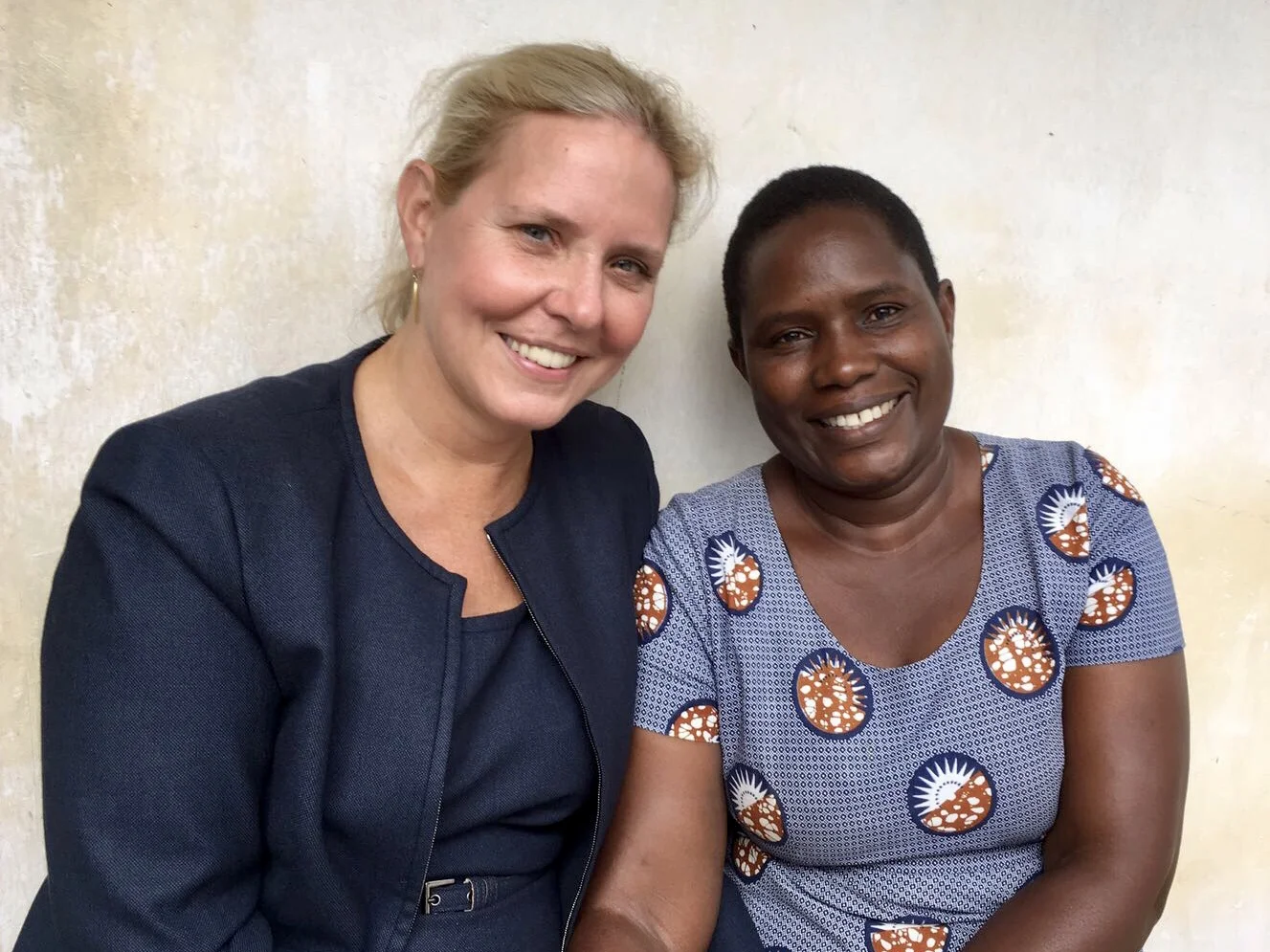 Dr. DeStigter and Miss Rita outside the ultrasound scanning room.