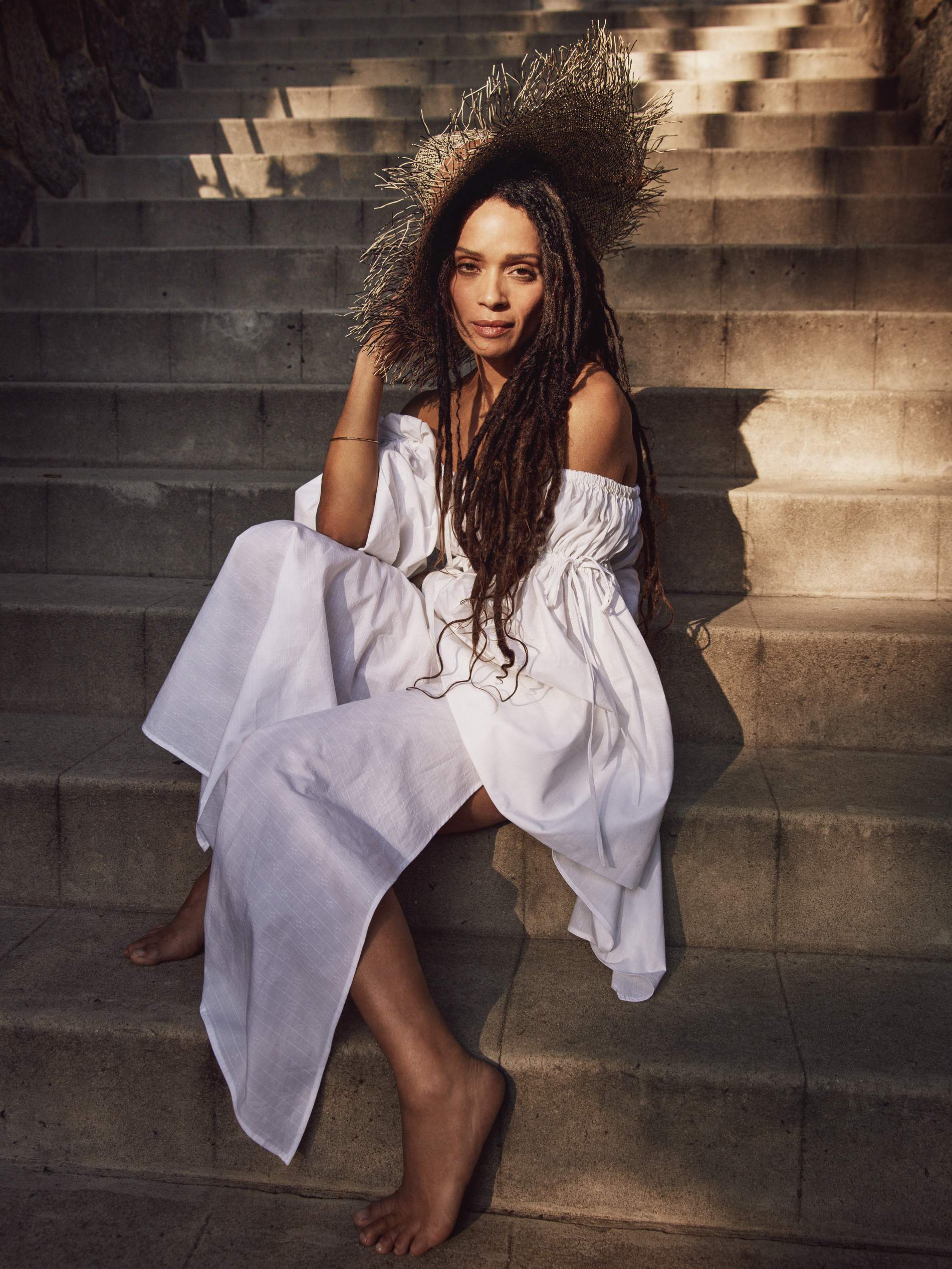 Top Diane von Furstenberg; skirt Brock Collection; earrings Ippolita. Dress Attico; hat Sensi Studio; bracelet Ippolita