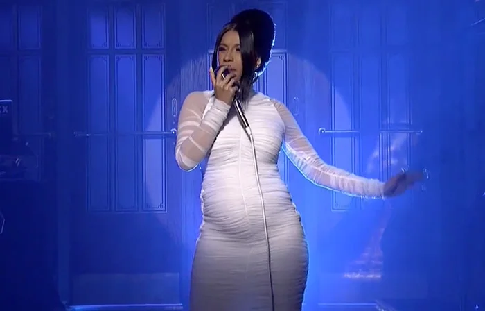 Cardi B officially confirms her pregnancy while performing "Be Careful" on SNL April 7th 2018.