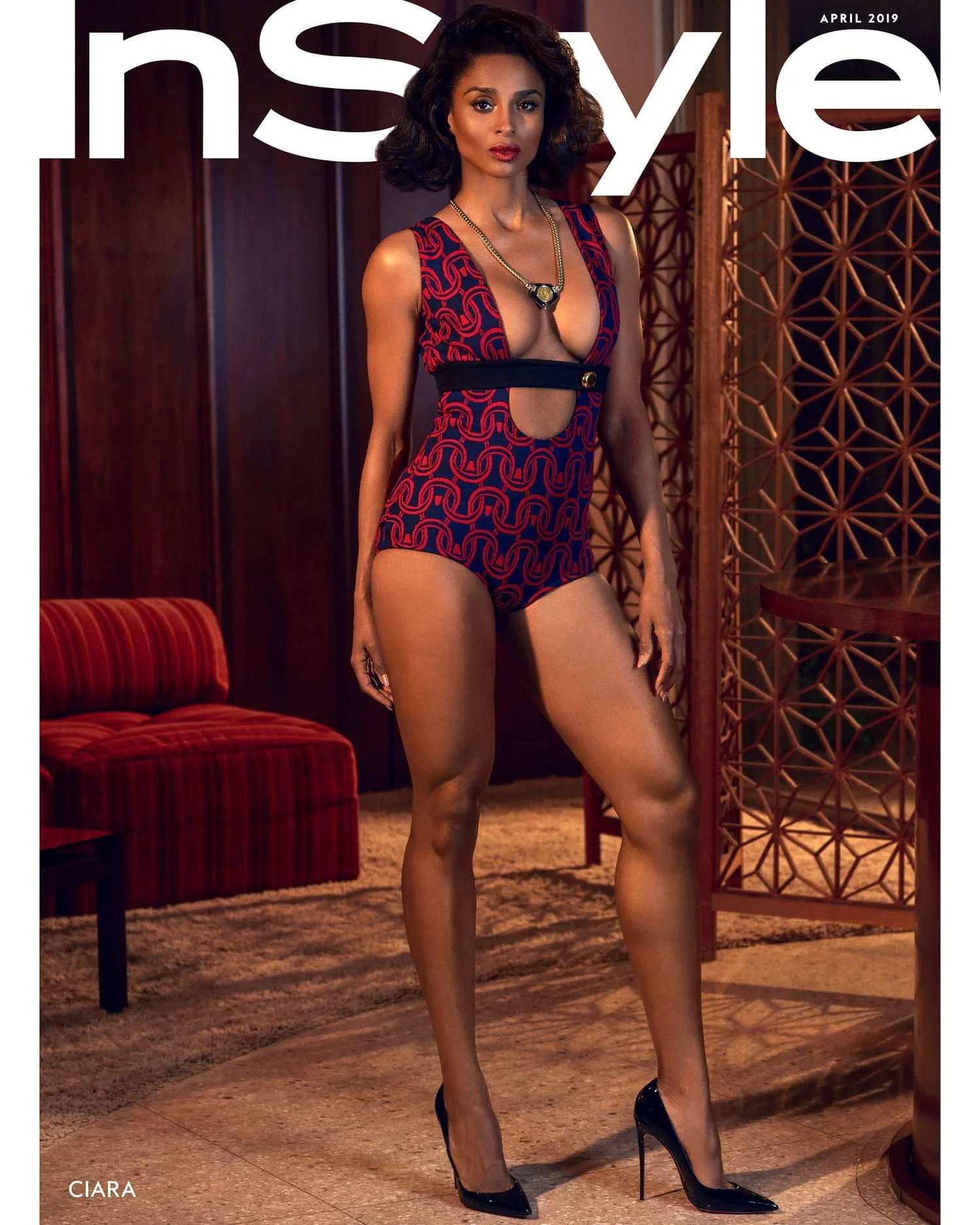Ciara in a Prada bodysuit, vintage Bulgari necklace from Beladora, and Christian Louboutin pumps.