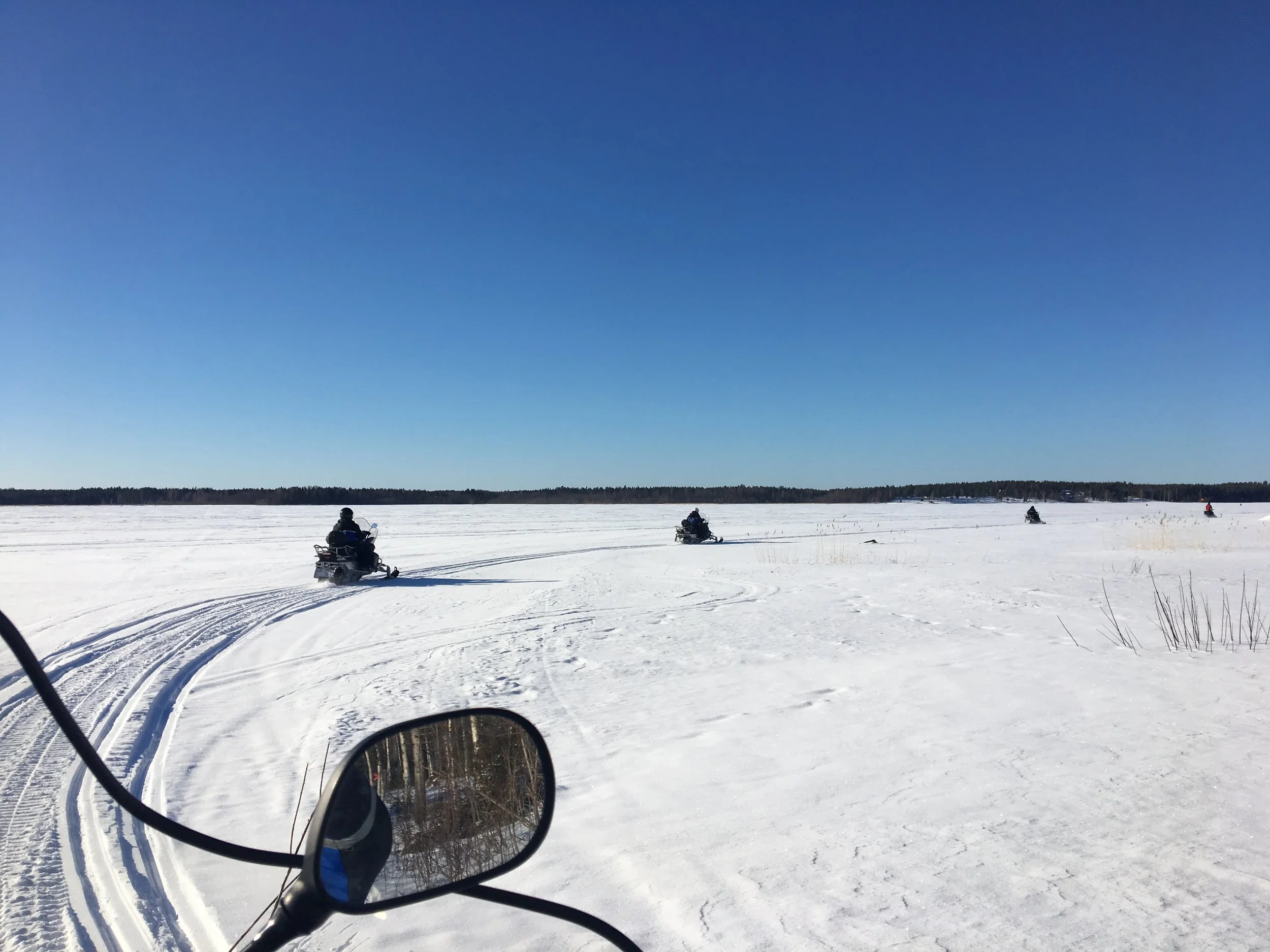Snowmobiling on the Bay of Bothnia