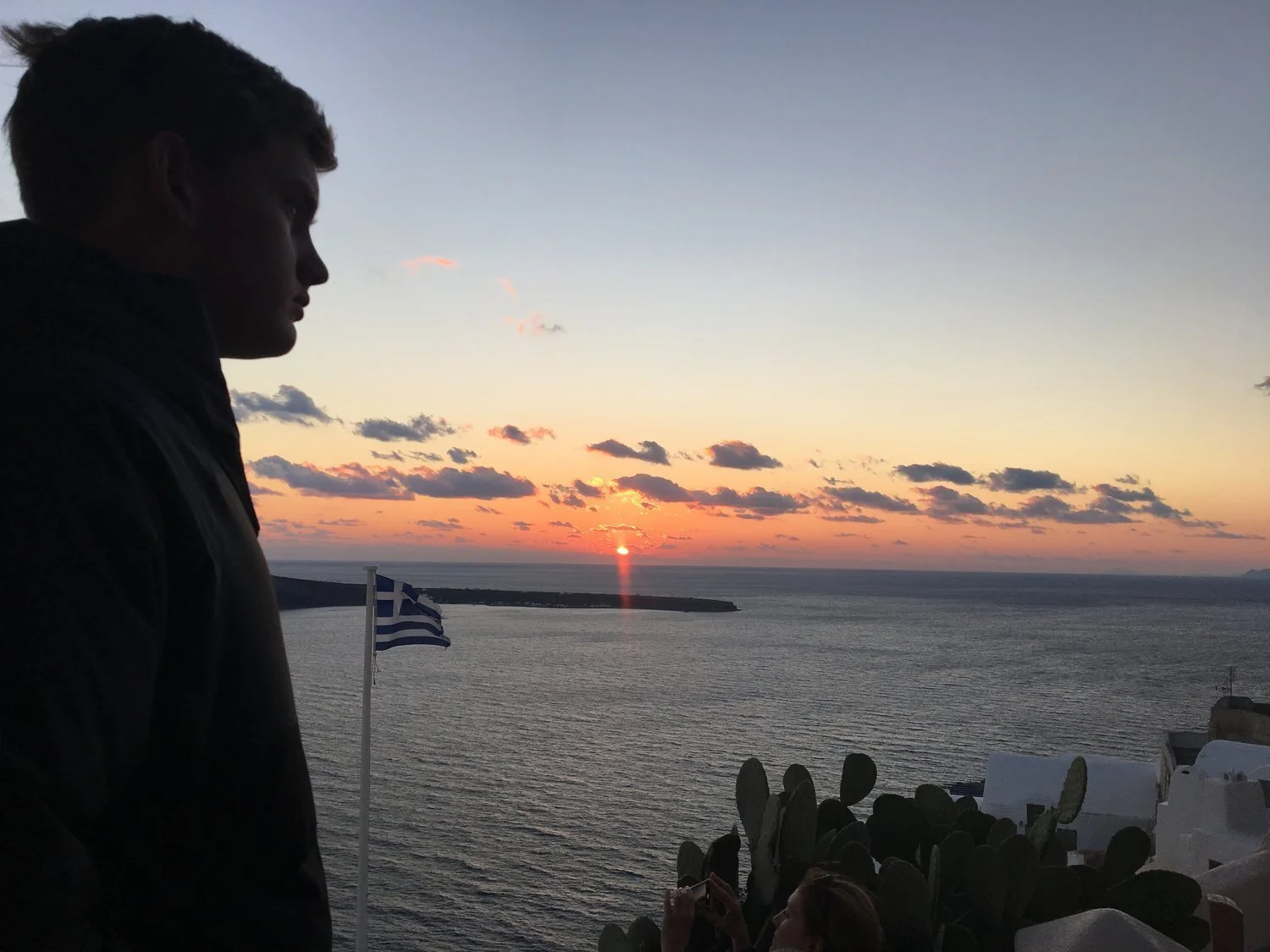 The sun sets on Santorini and we begin our journey north.