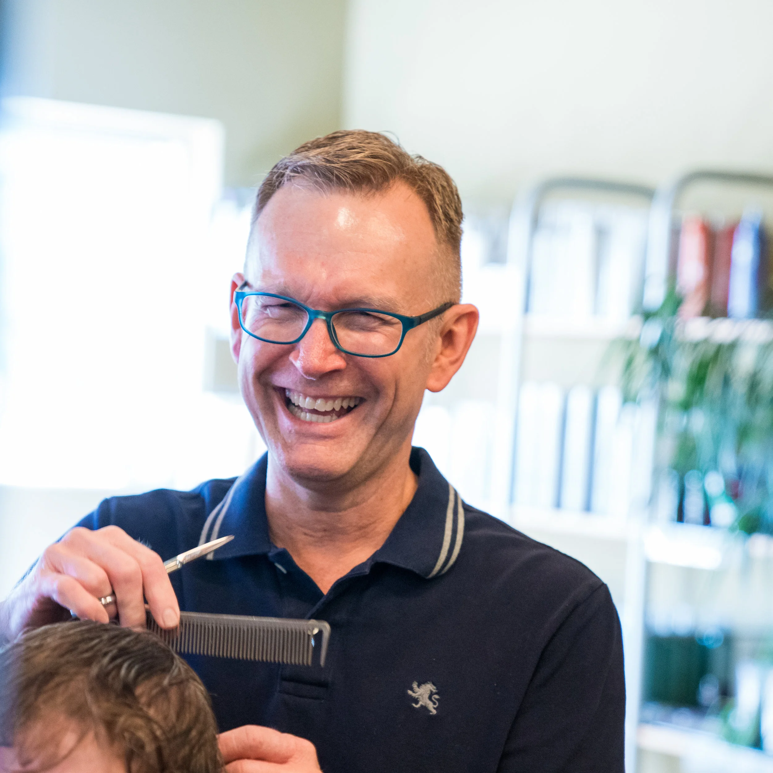 Greg Harman Owner/Stylist Through my work, I watch spirits lift as the people who sit in my chair see what I see in the mirror - something beautiful. Something positive. Something possible. My clientele is very special to me. Many of them I have known and worked with for years... and their children...and their children’s children. I’m quite proud of the work I’ve done, and I cherish the relationships I have made. In 2003, I opened The Laura Gregory Salon with my friend of over two decades, Laura Puhl. I couldn’t be more proud of this space and the atmosphere we have created together.