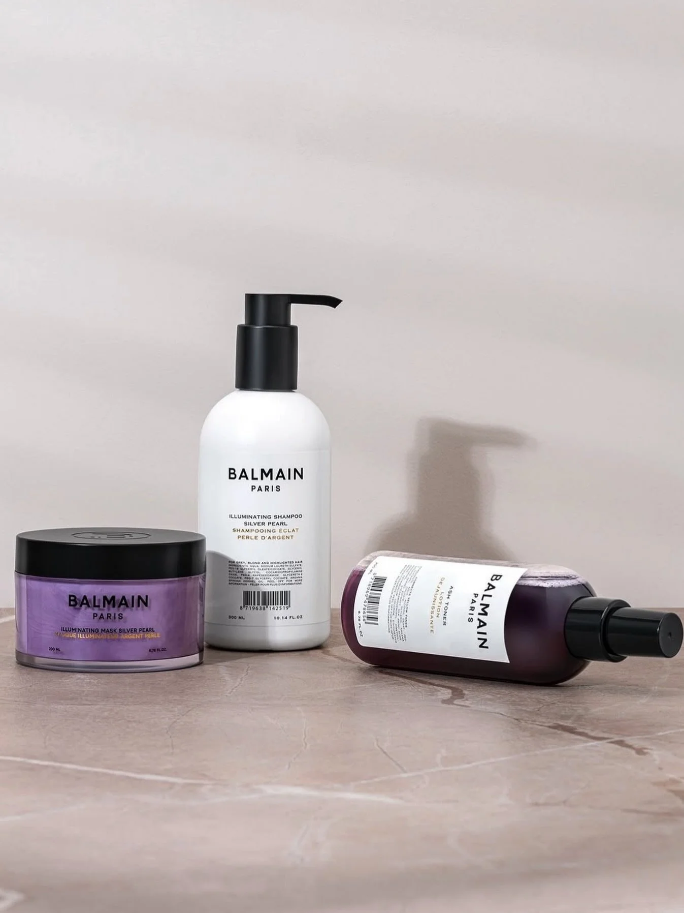 An exclusive trio made for your coolest summer yet ❄️✨
Think crystal blonde, luminous silver, and that glossy grey glow we all crave.

The Balmain Hair Couture Illuminating range is your ultimate brightening ritual &mdash; featuring the Silver Pearl 