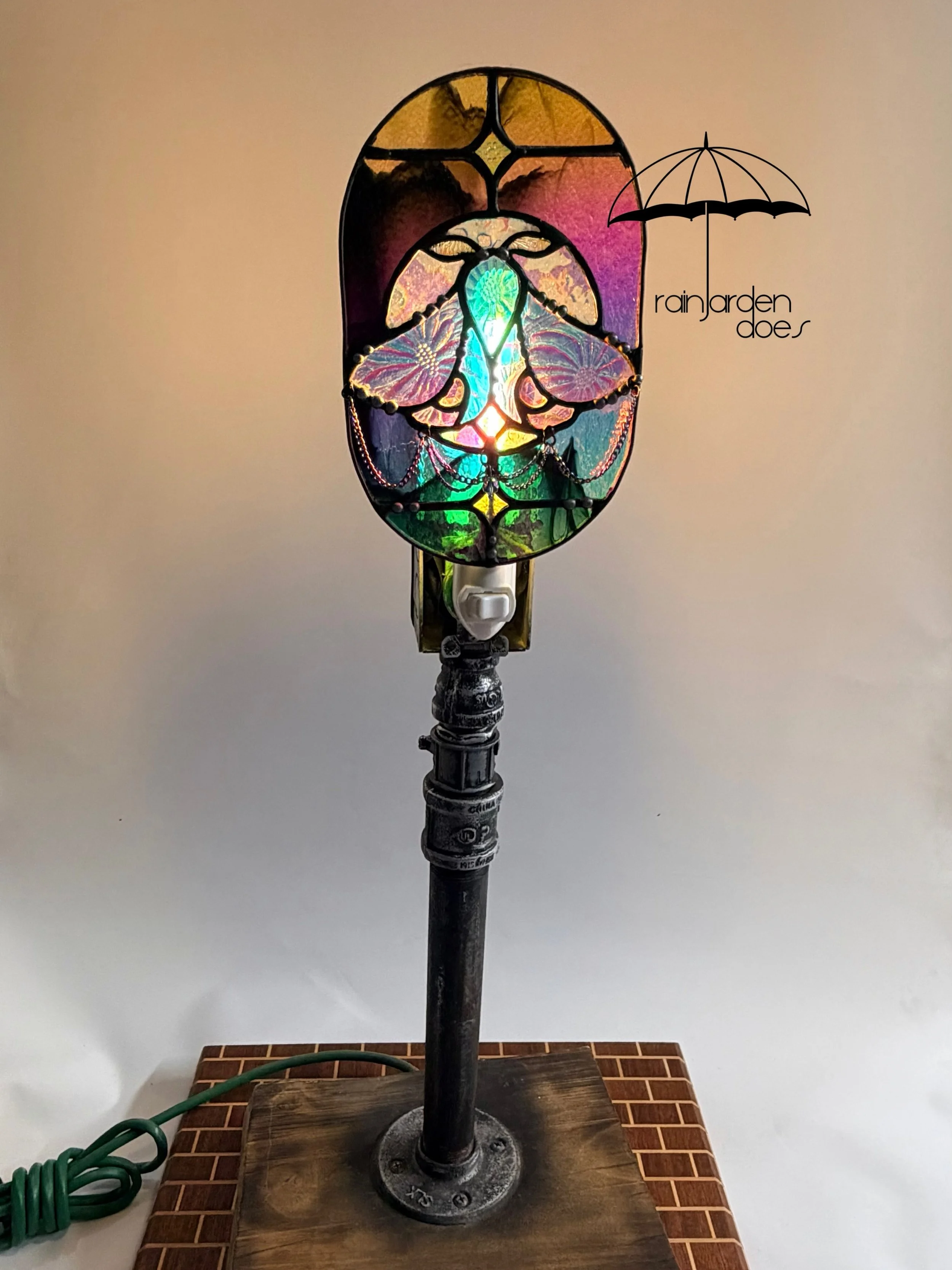 Somewhere between a nightlight and a tiny haunted cathedral. 🖤✨ Built from glass, pipe, and the deeply held belief that functional objects should be allowed to be dramatic as phuckkkk.

Comin&rsquo; in at 4&rdquo;x6&rdquo; she&rsquo;s got dozens of 