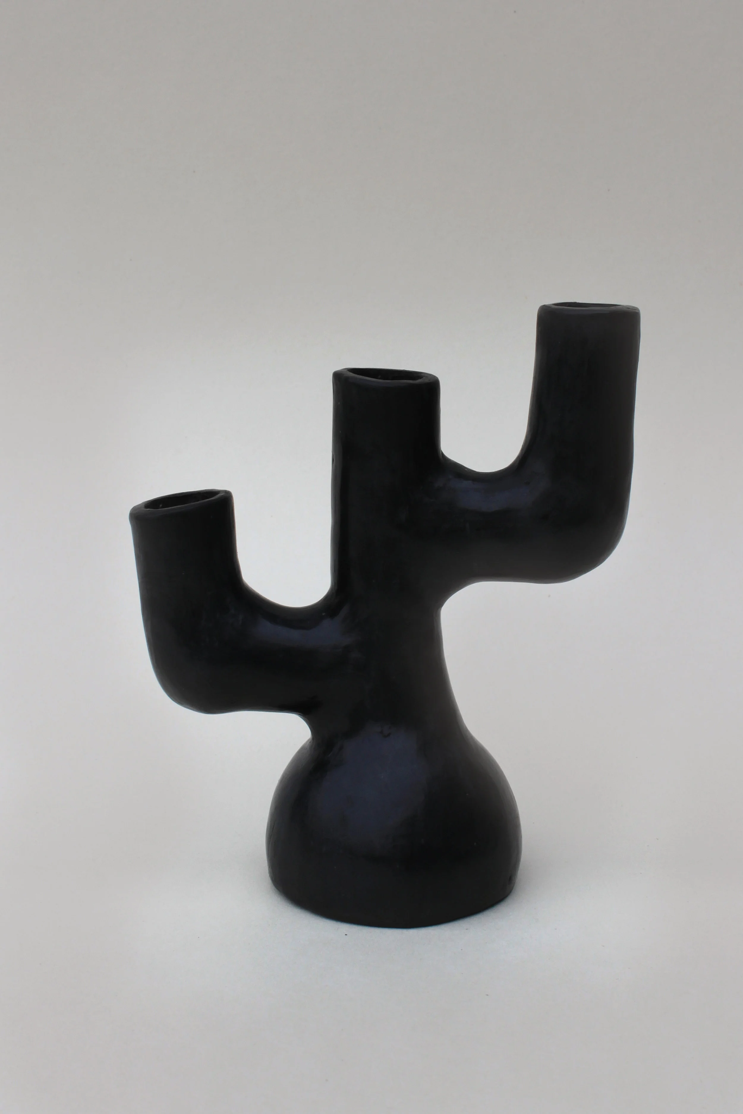 20.Three armed candle holder 1.jpg