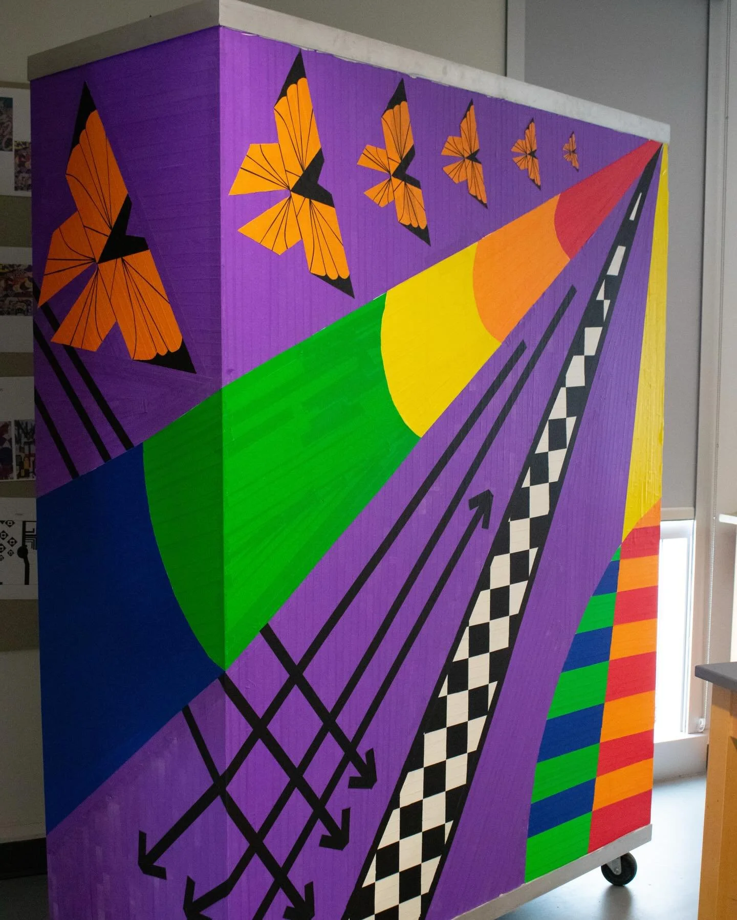 Sticking It Together

Students were split into three groups to work on a five-week project that takes the form of large-scale tape art on a 3-sided movable wall. Each group drew inspiration from Richard Niessen&rsquo;s work in style, approach, and te