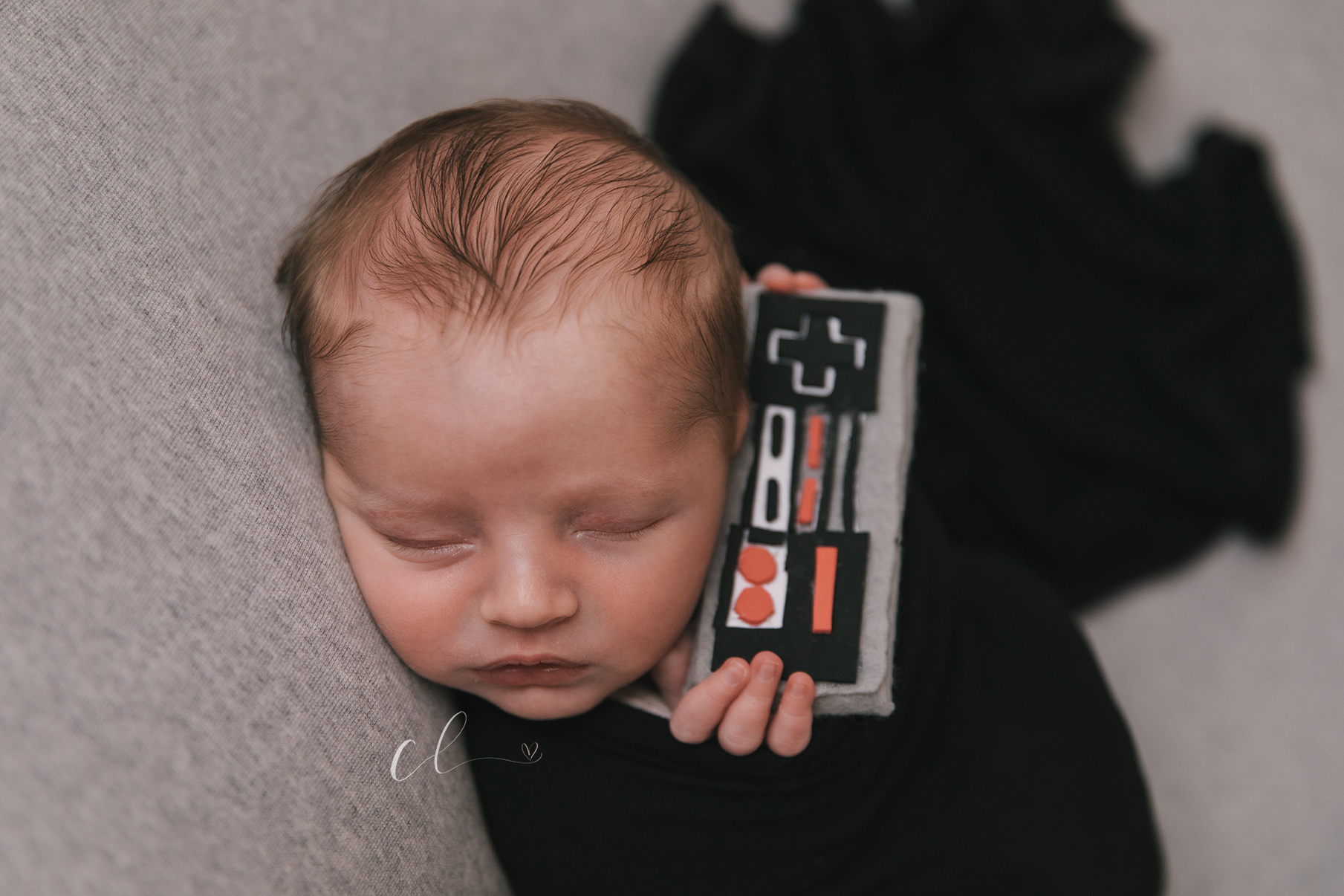 nintendo prop gaming newborn baby session in cortland ohio by newborn photographer christie leigh photo warren ohio sharon pa youngstown oh._2.jpg