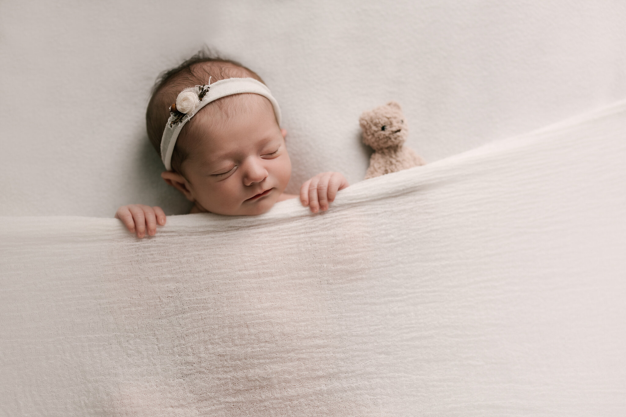 Tucked_in_Pose_All_White_Sweet_Baby_Girl_Studio_Session_by_Newborn_Photographer_Christie_Leigh_Photo_Austintown_OH_Ohio-1.JPG