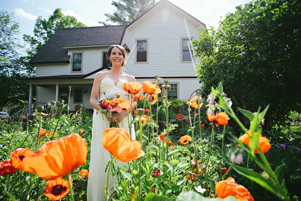 Bride in field of flowers