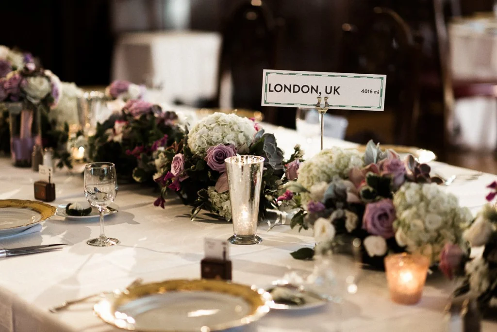Purple, white and grey centerpiece with succulents at Minneapolis Club