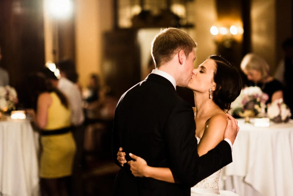 Bride and groom kissing on the dance floor during reception at Minneapolis Clube