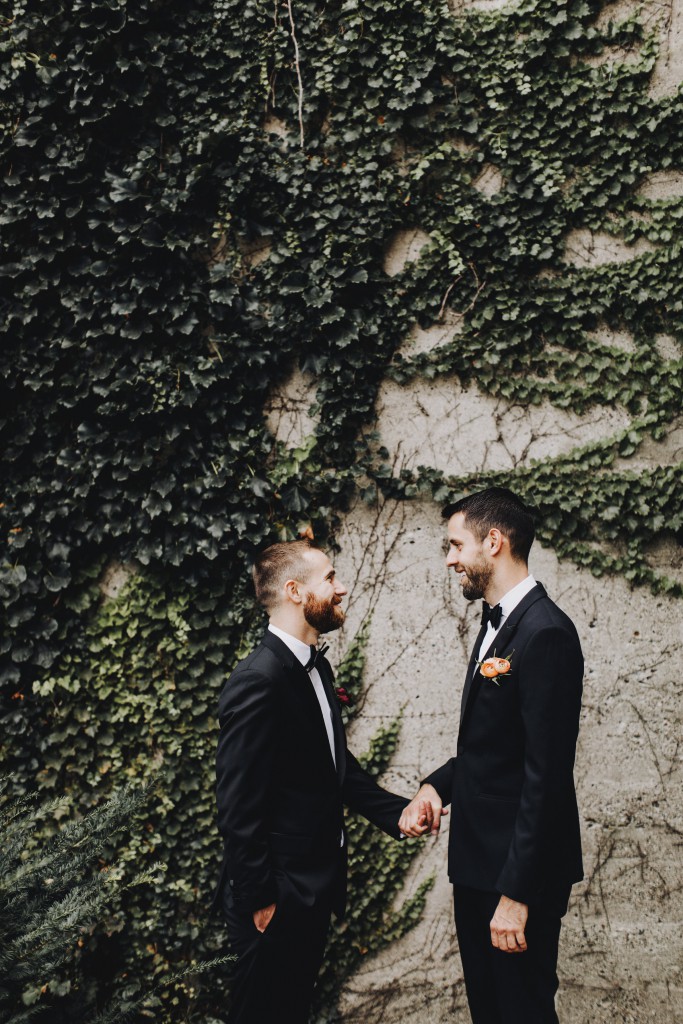 Groom's pose for wedding photo, at Tilia in Linden Hills, Minnesota