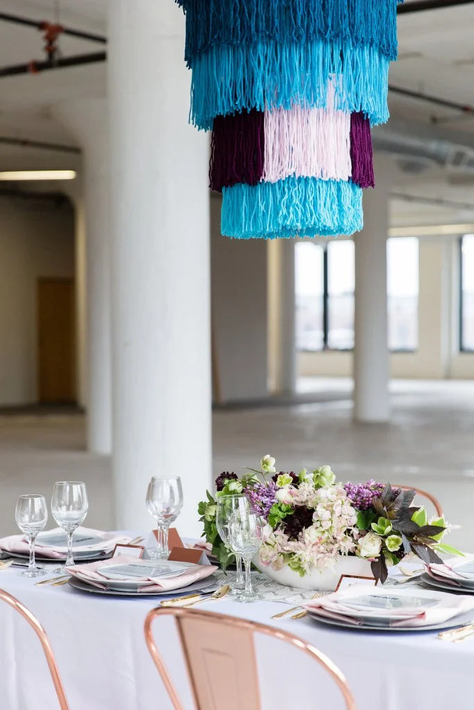 Modern wedding inspiration with copper/rose gold, purple and blue accents, warehouse wedding venue