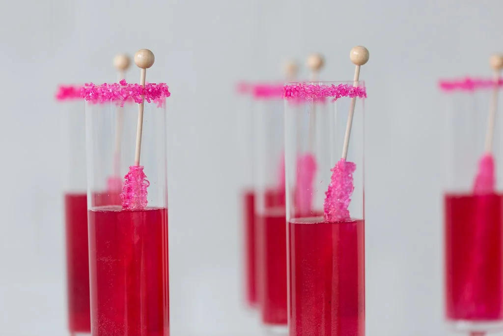 Drink station, bar ideas for wedding, rock candy, pink sugar rimmed cocktail
