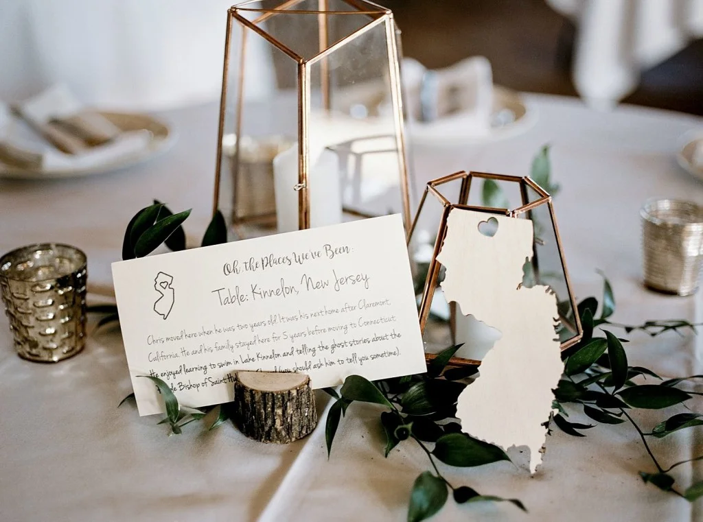 Geometric lantern centerpiece with unique table numbers/names
