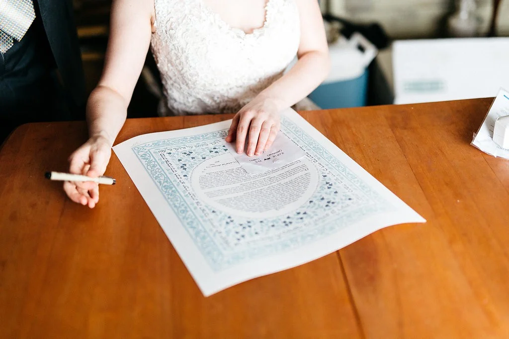 Bride signing of the Ketubah, Jewish wedding contract