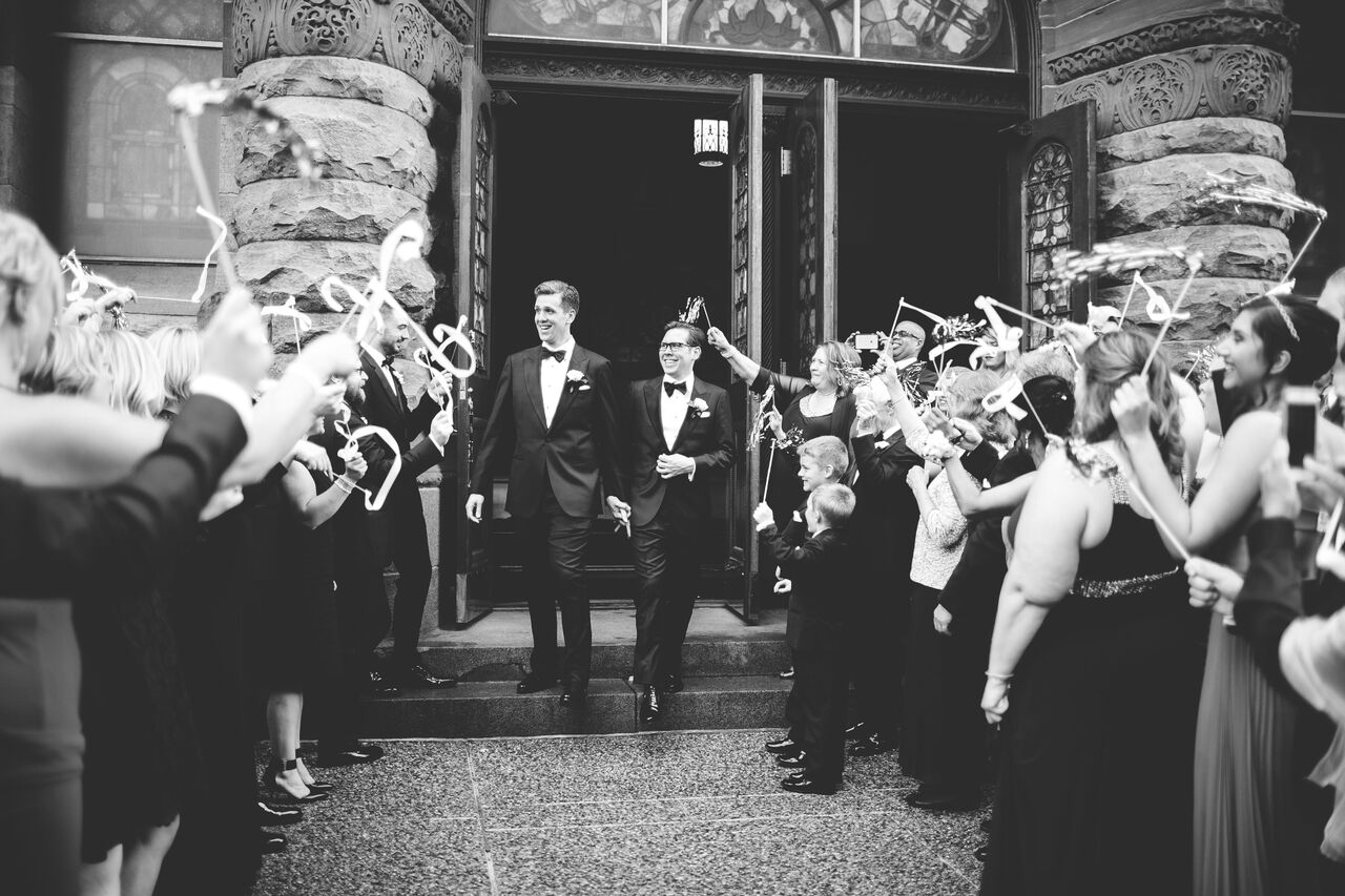 Grooms walking out for grand exit