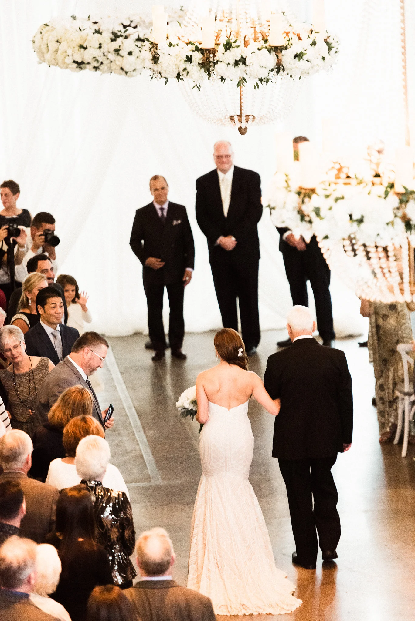 father walking the bride down the aisle
